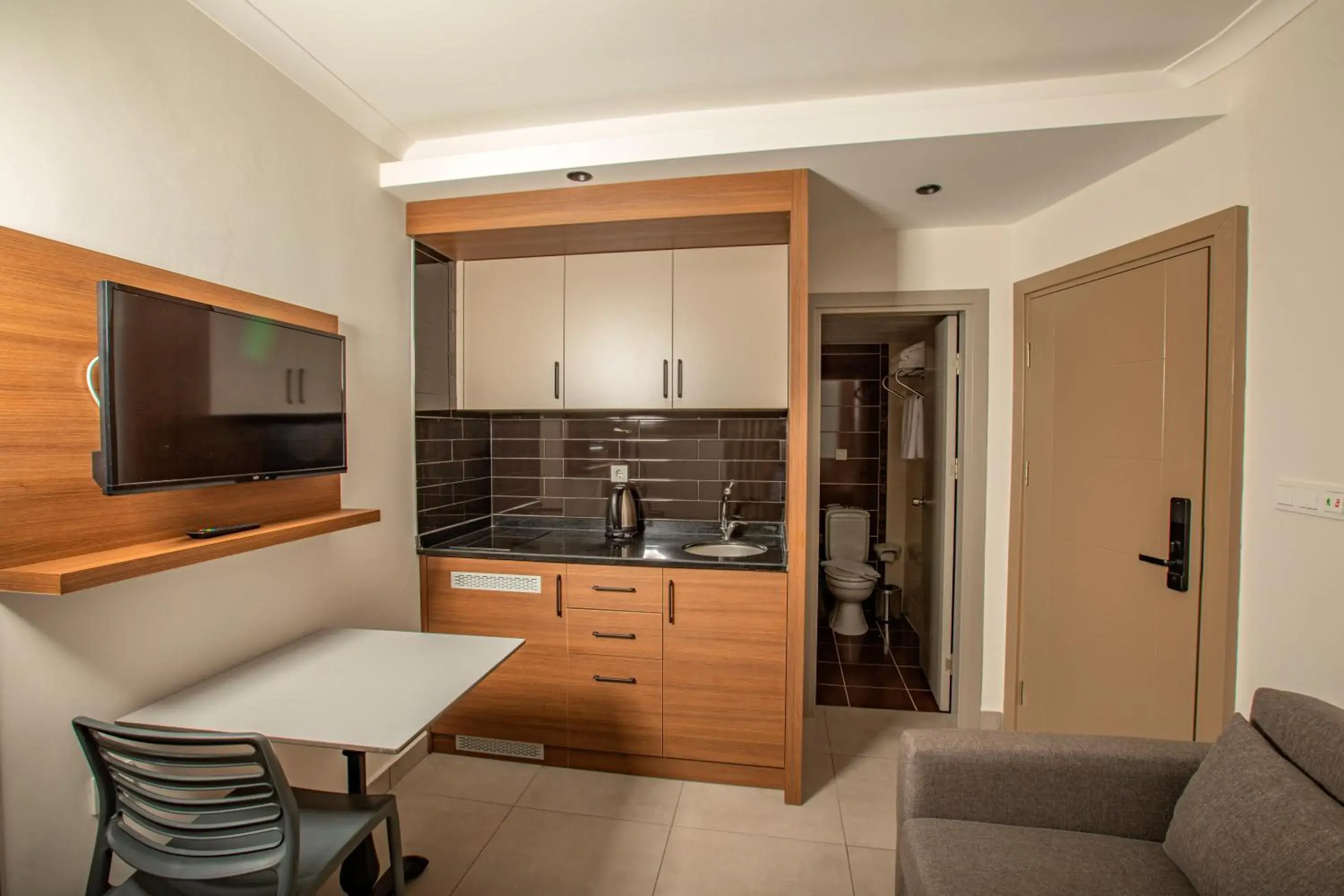 Living room in Perle Apart Hotel Living room in Perle Apart Hotel