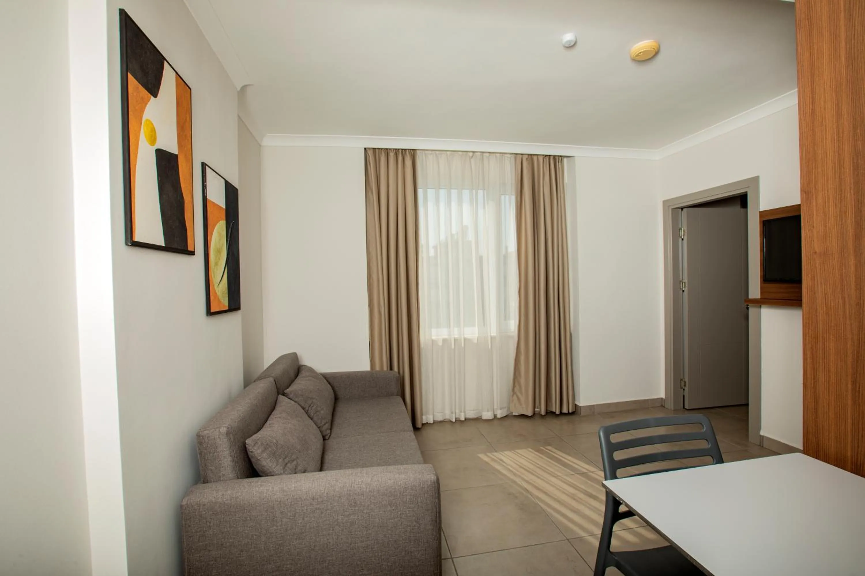 Living room in Perle Apart Hotel