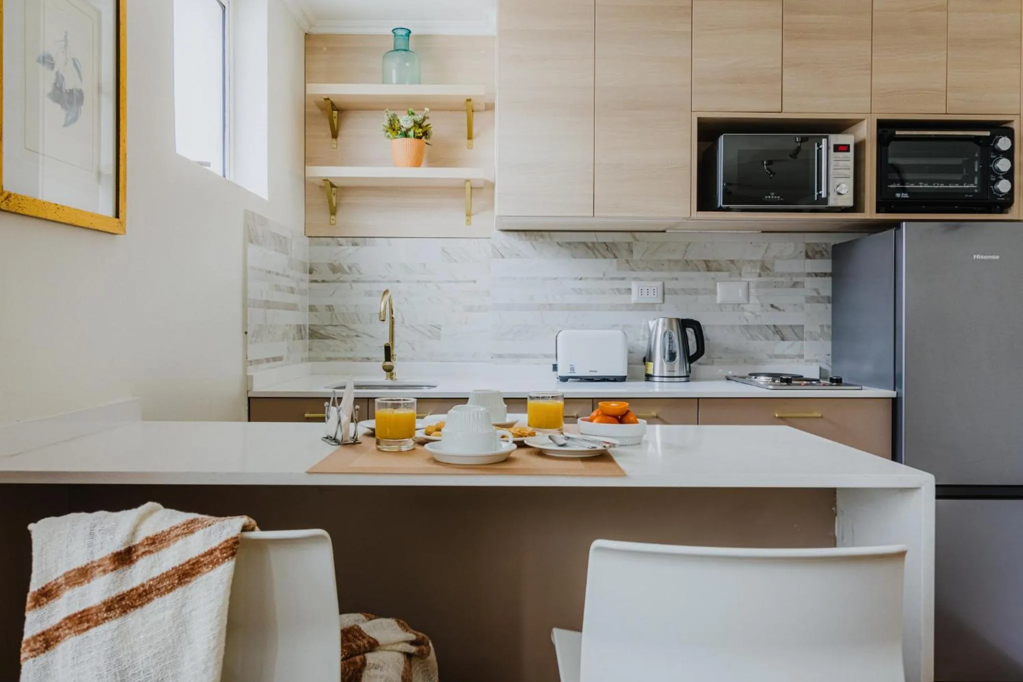 Kitchen or kitchenette in Orly Suites
