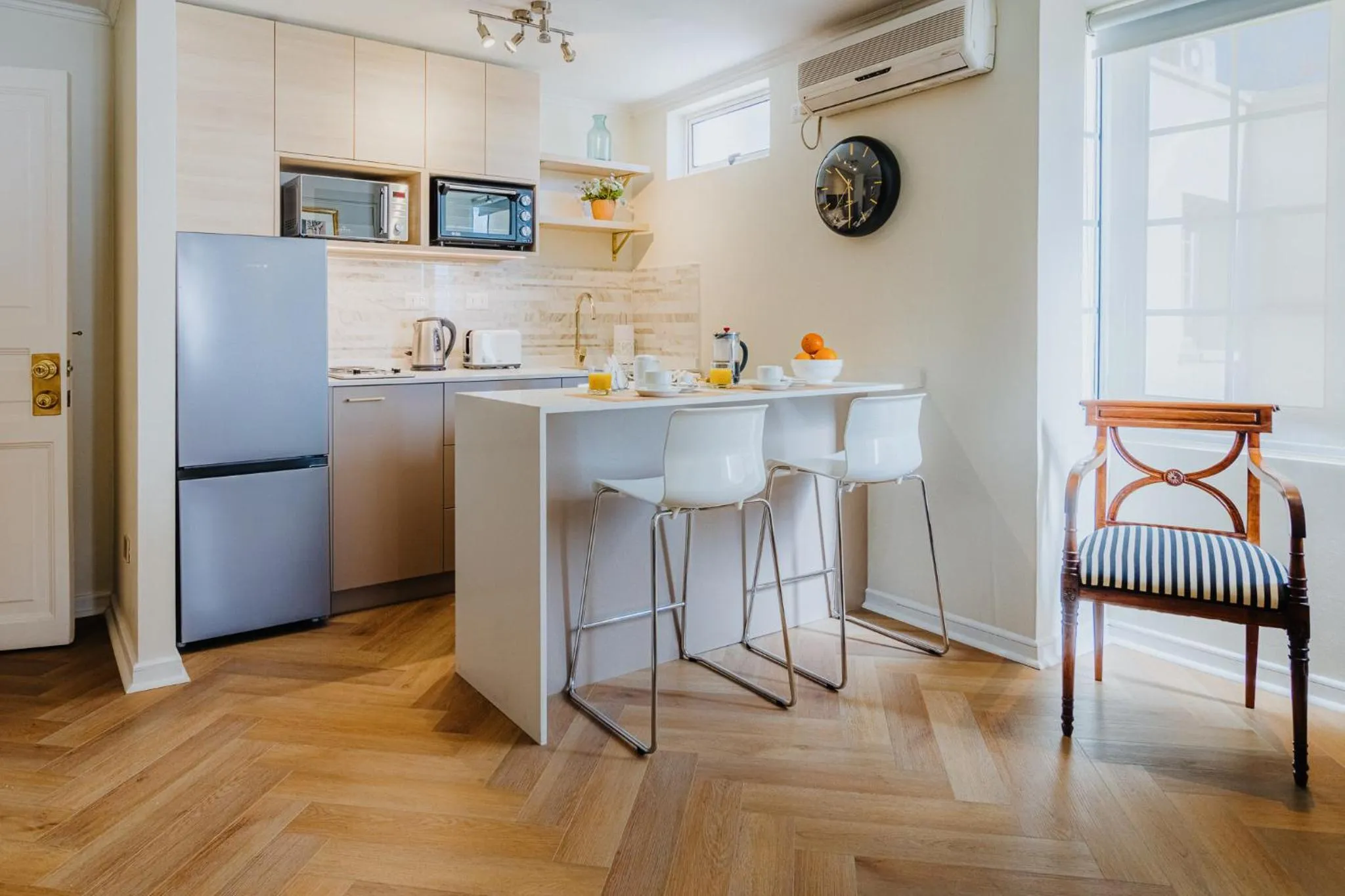 Kitchen or kitchenette in Orly Suites