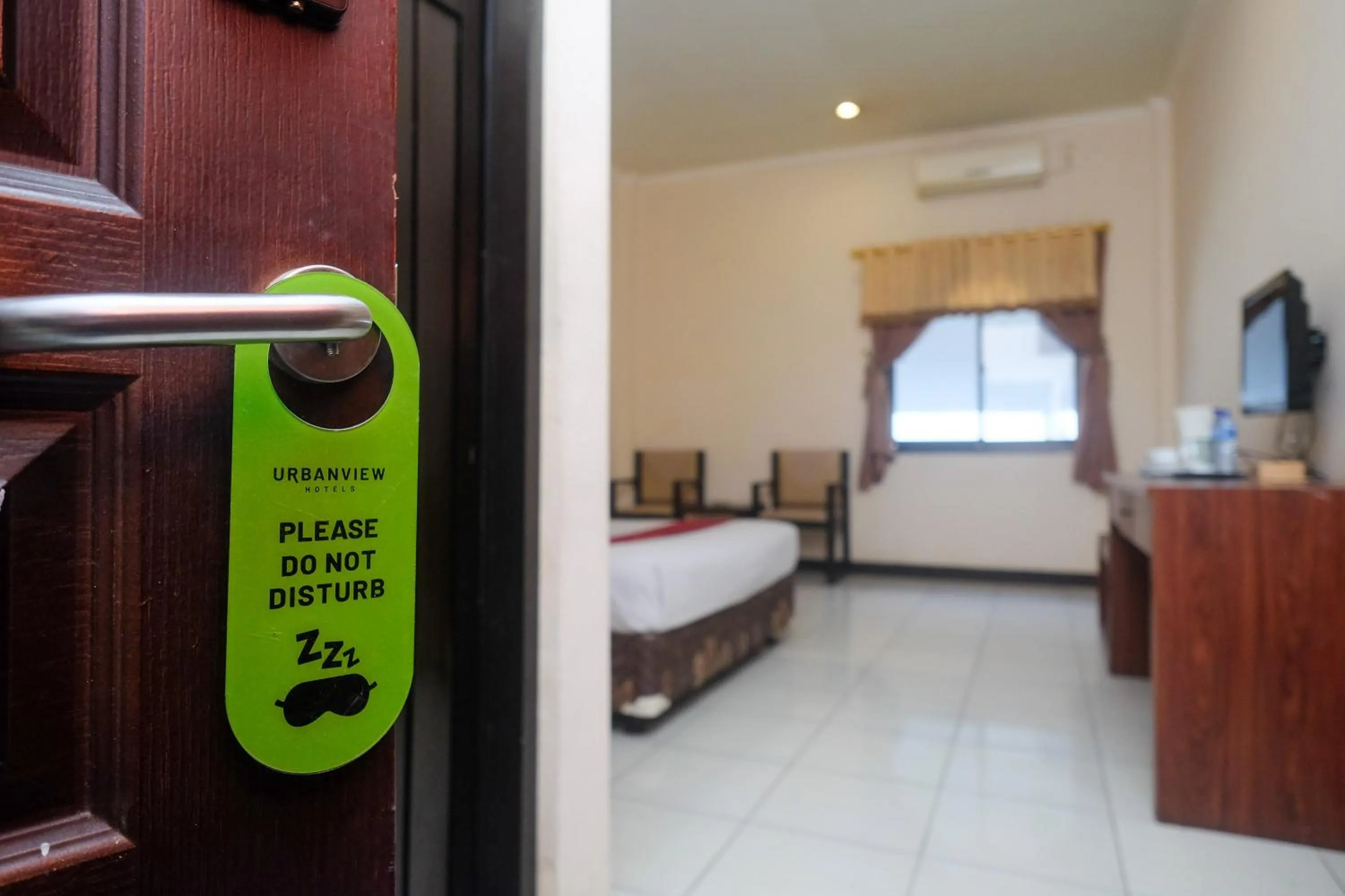 Bedroom, Bed in Urbanview Hotel Anggraeni Jatibarang