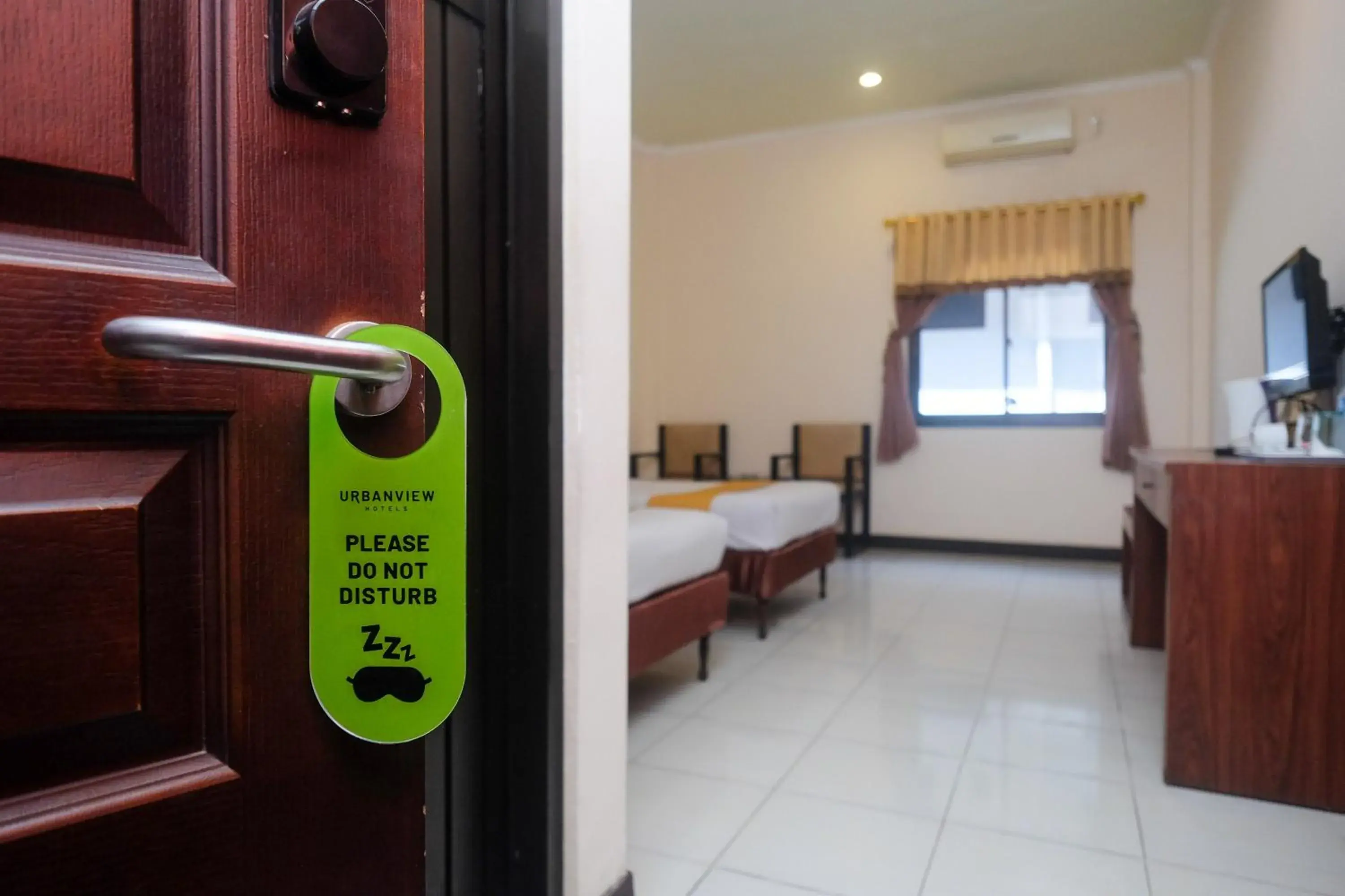 Bedroom in Urbanview Hotel Anggraeni Jatibarang Bedroom in Urbanview Hotel Anggraeni Jatibarang