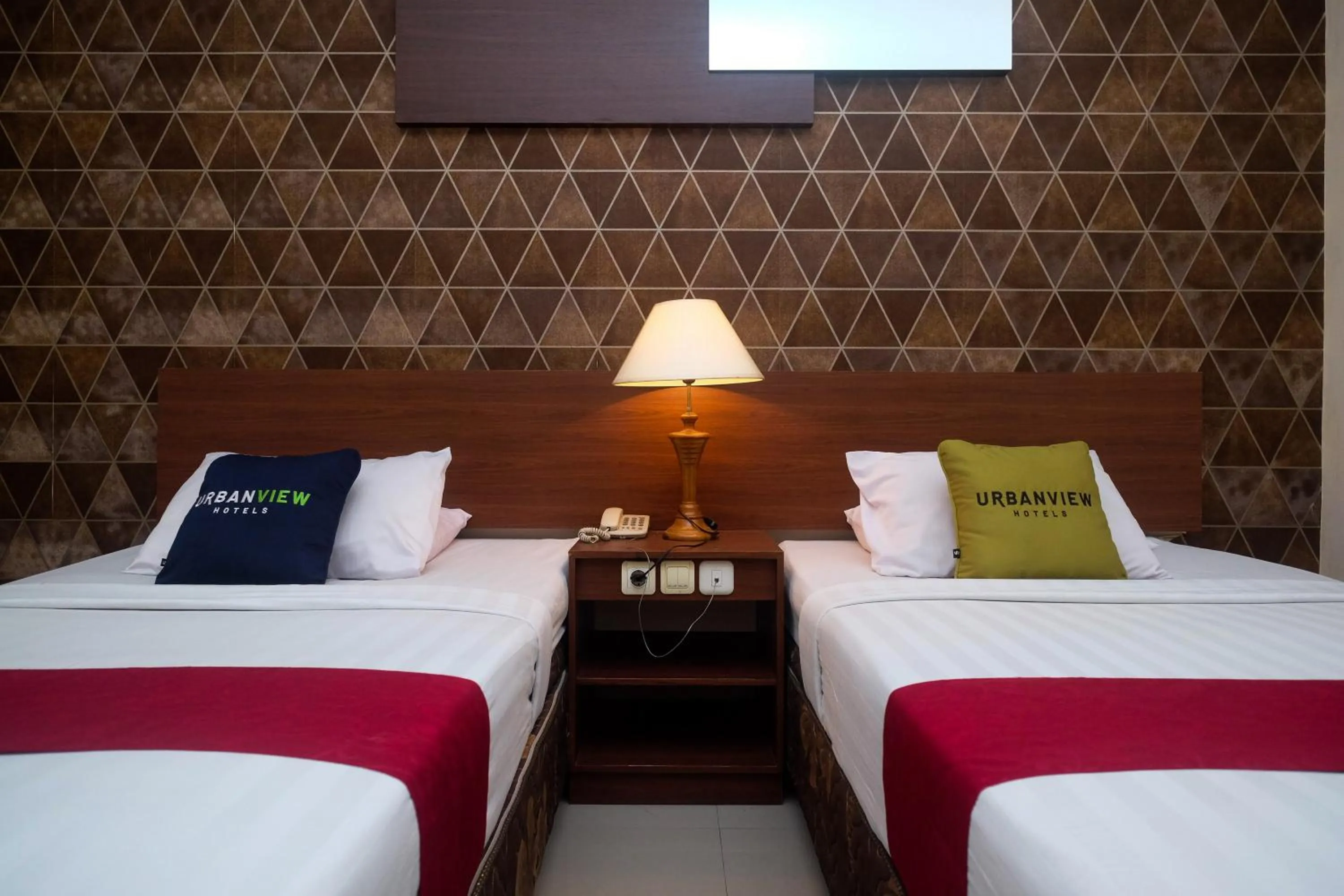 Bed in Urbanview Hotel Anggraeni Jatibarang