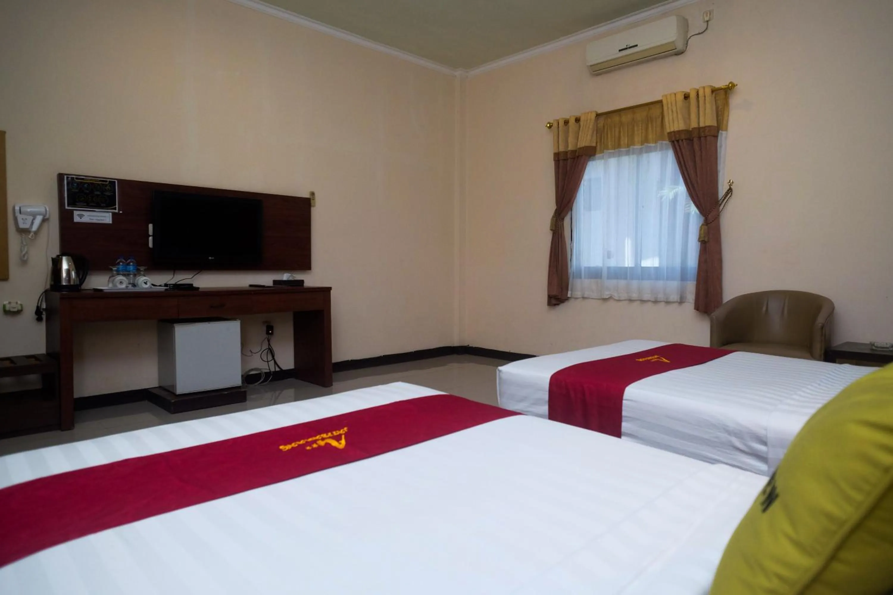 Bed in Urbanview Hotel Anggraeni Jatibarang