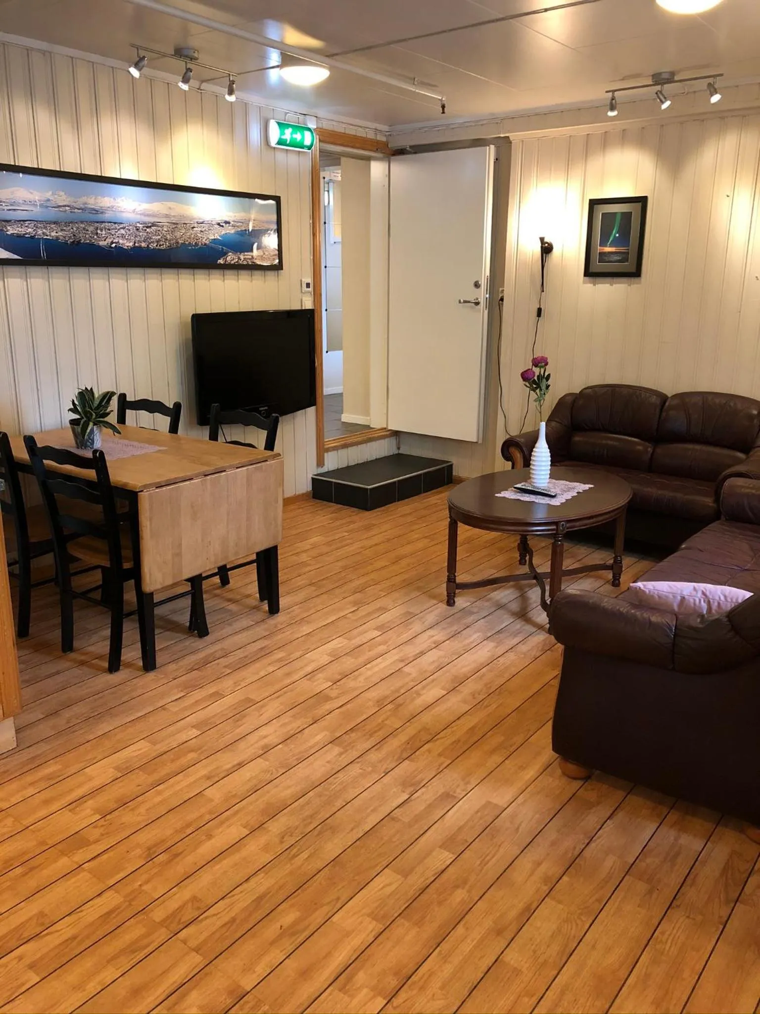 Communal lounge/ TV room in Ami Hotel