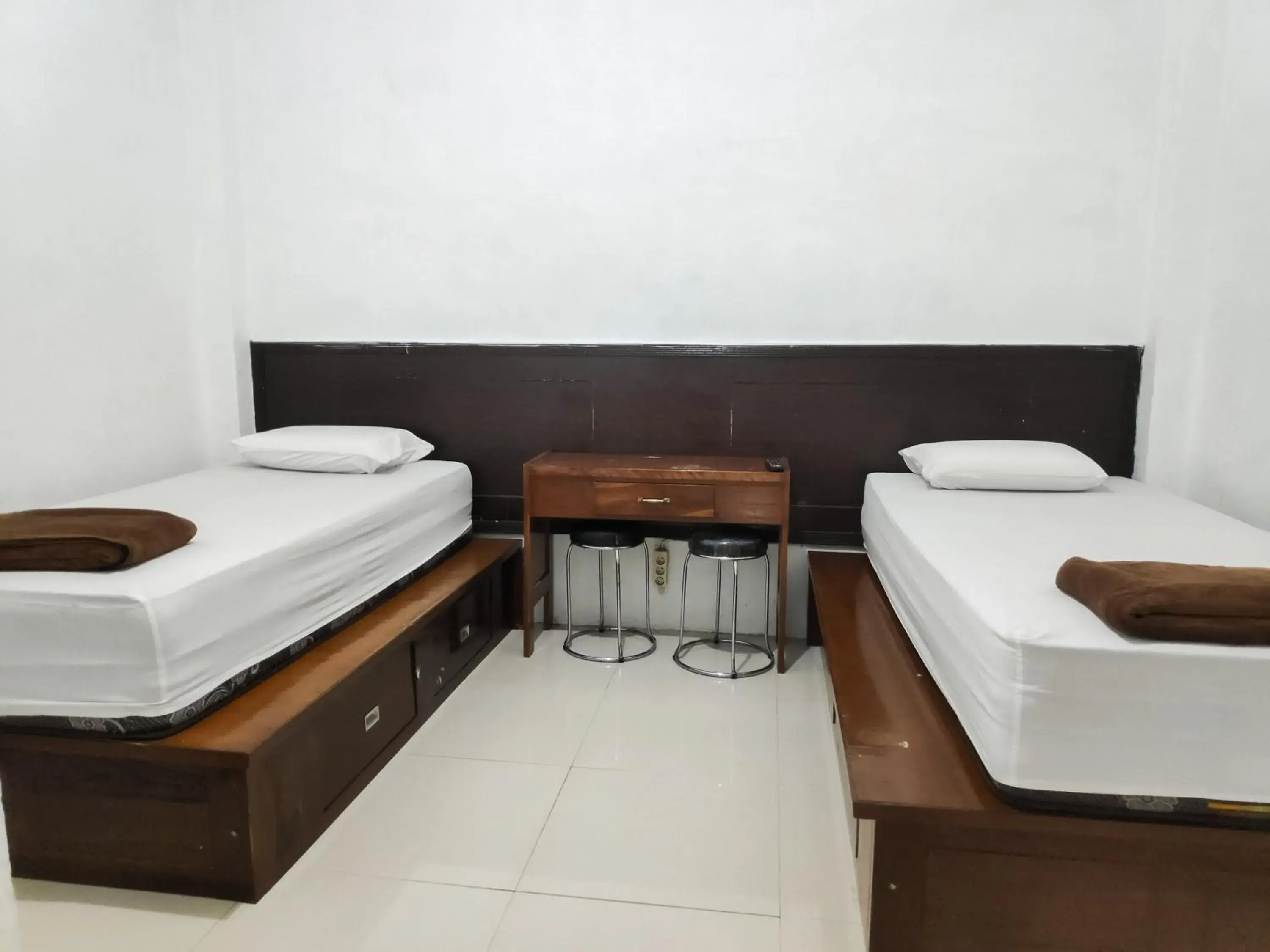 Standard Twin Room in RedDoorz Syariah near Terminal Terpadu Langsa Standard Twin Room in RedDoorz Syariah near Terminal Terpadu Langsa