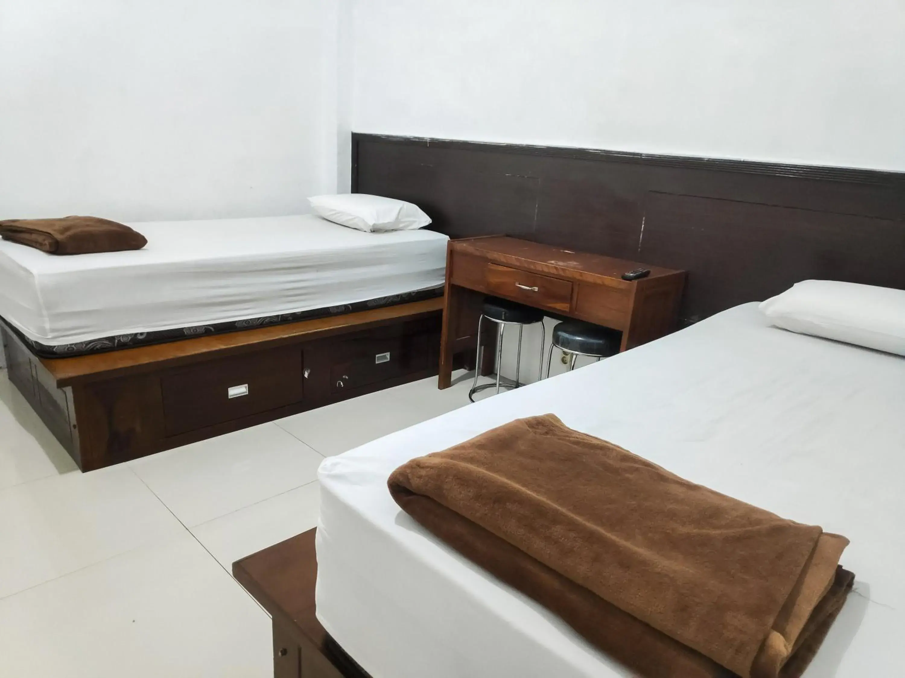 Bed in RedDoorz Syariah near Terminal Terpadu Langsa Bed in RedDoorz Syariah near Terminal Terpadu Langsa