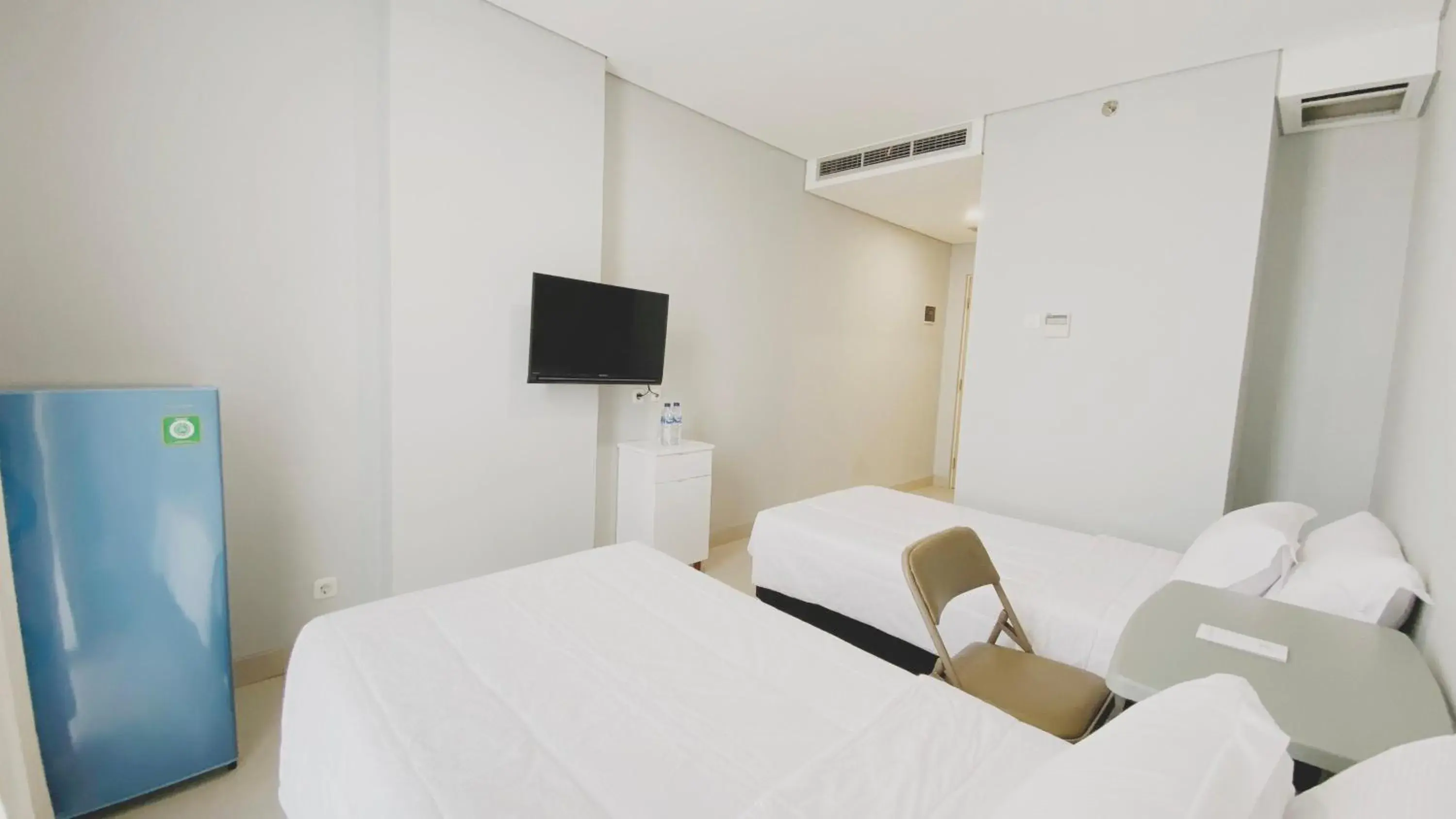 Economy Twin Room in MIC Residence Economy Twin Room in MIC Residence