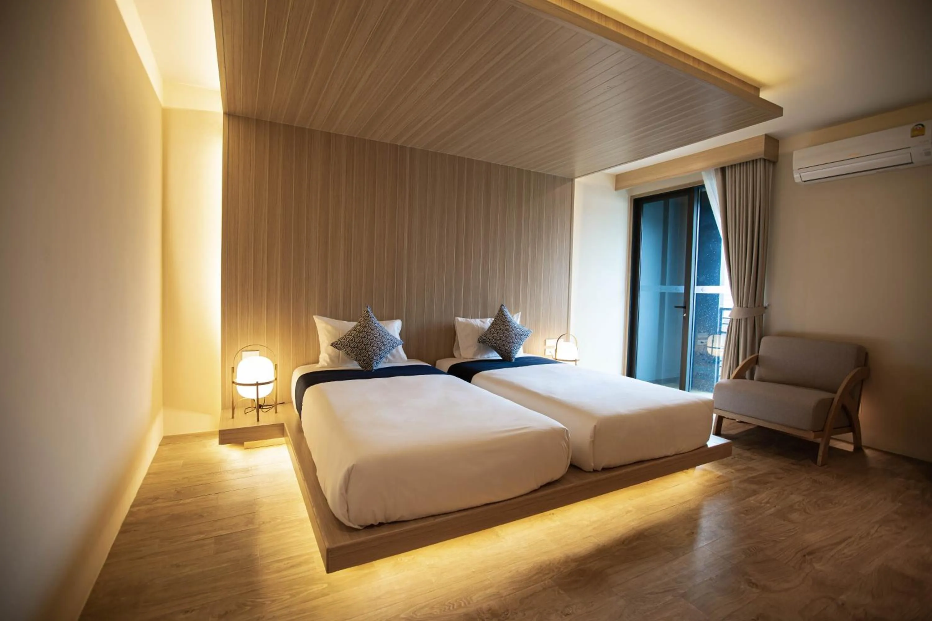 Bed in The Arch Phuket Hotel