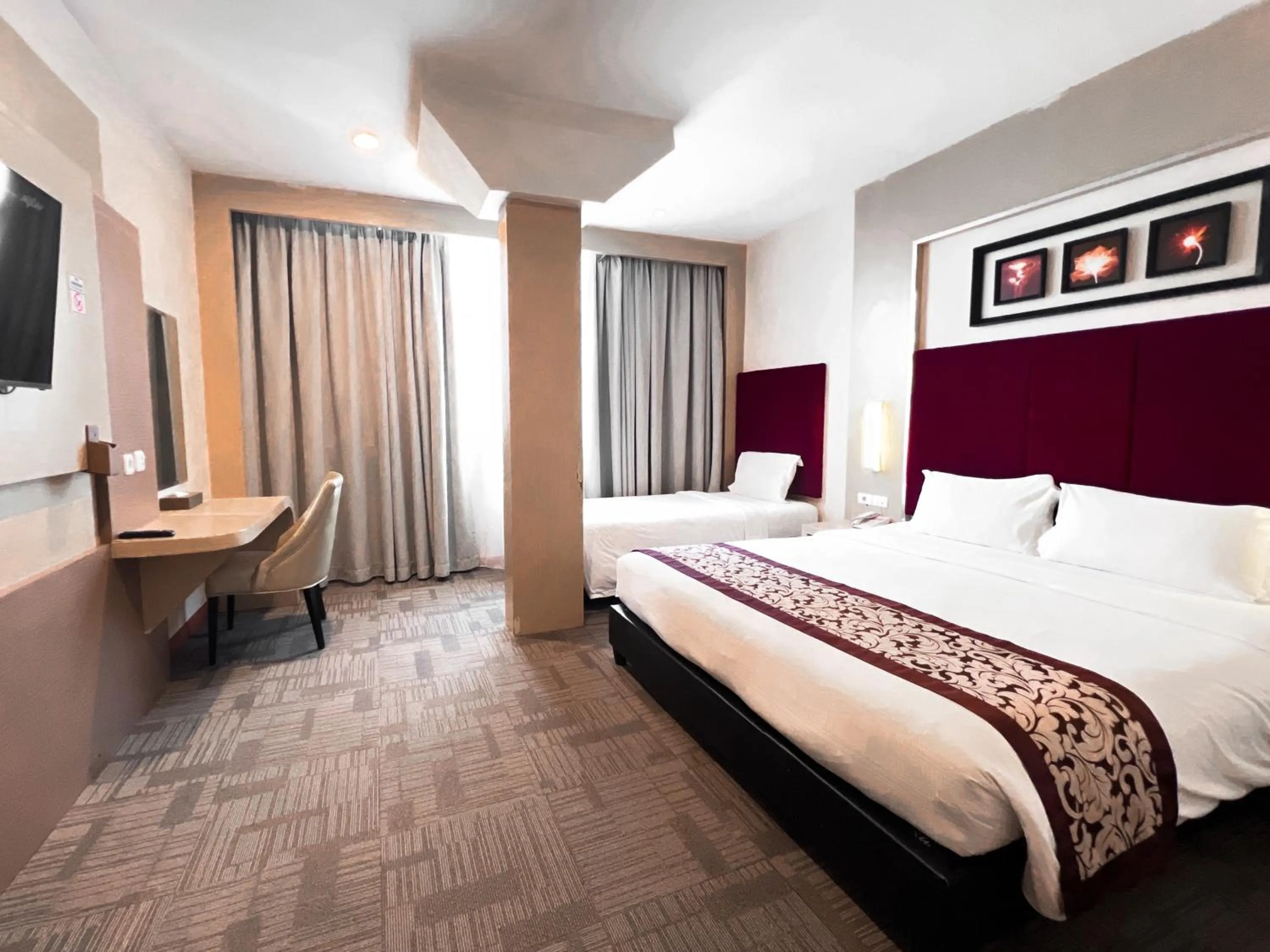 Bed in Batam City Hotel