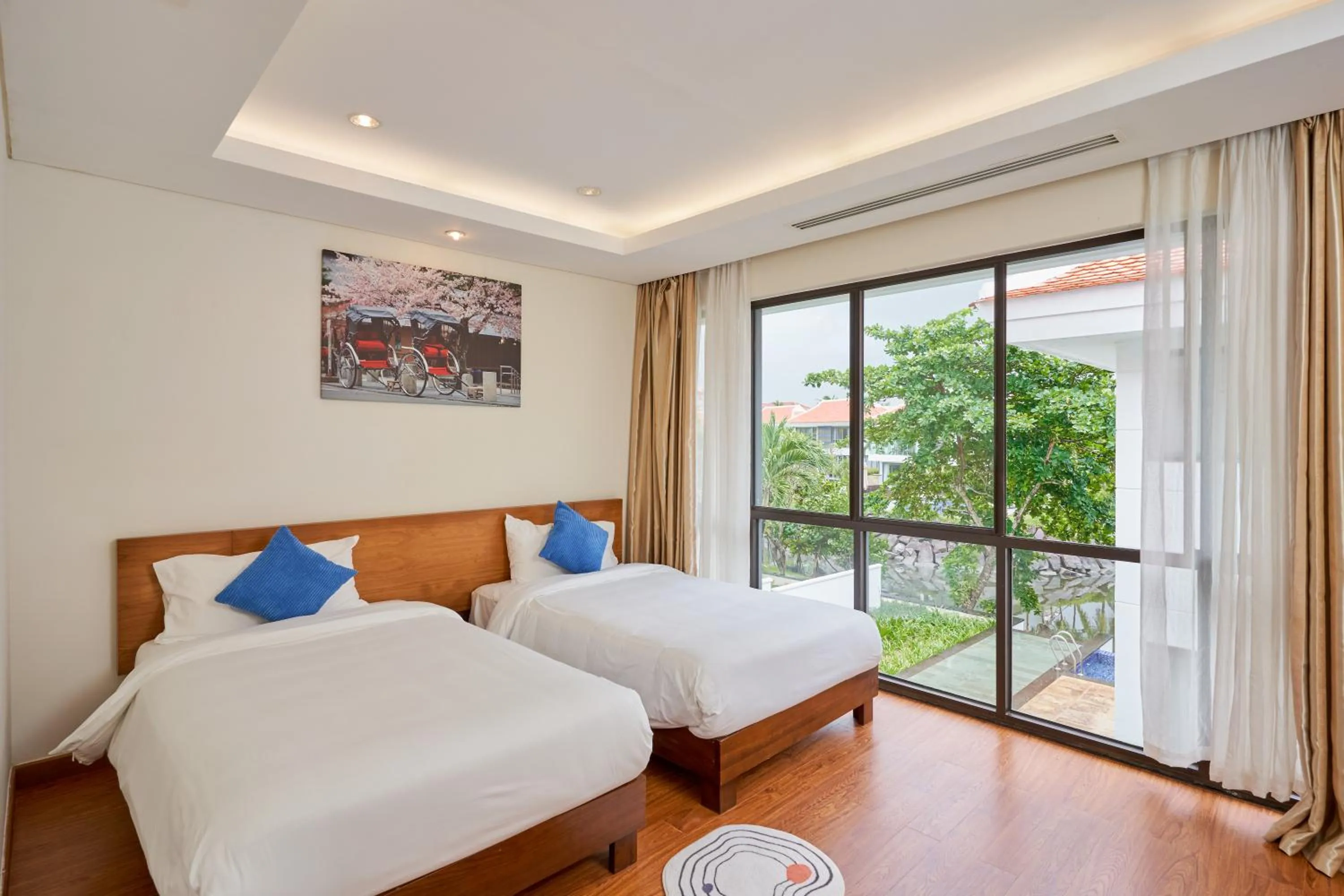 Bed in Ocean Beach Villas Danang