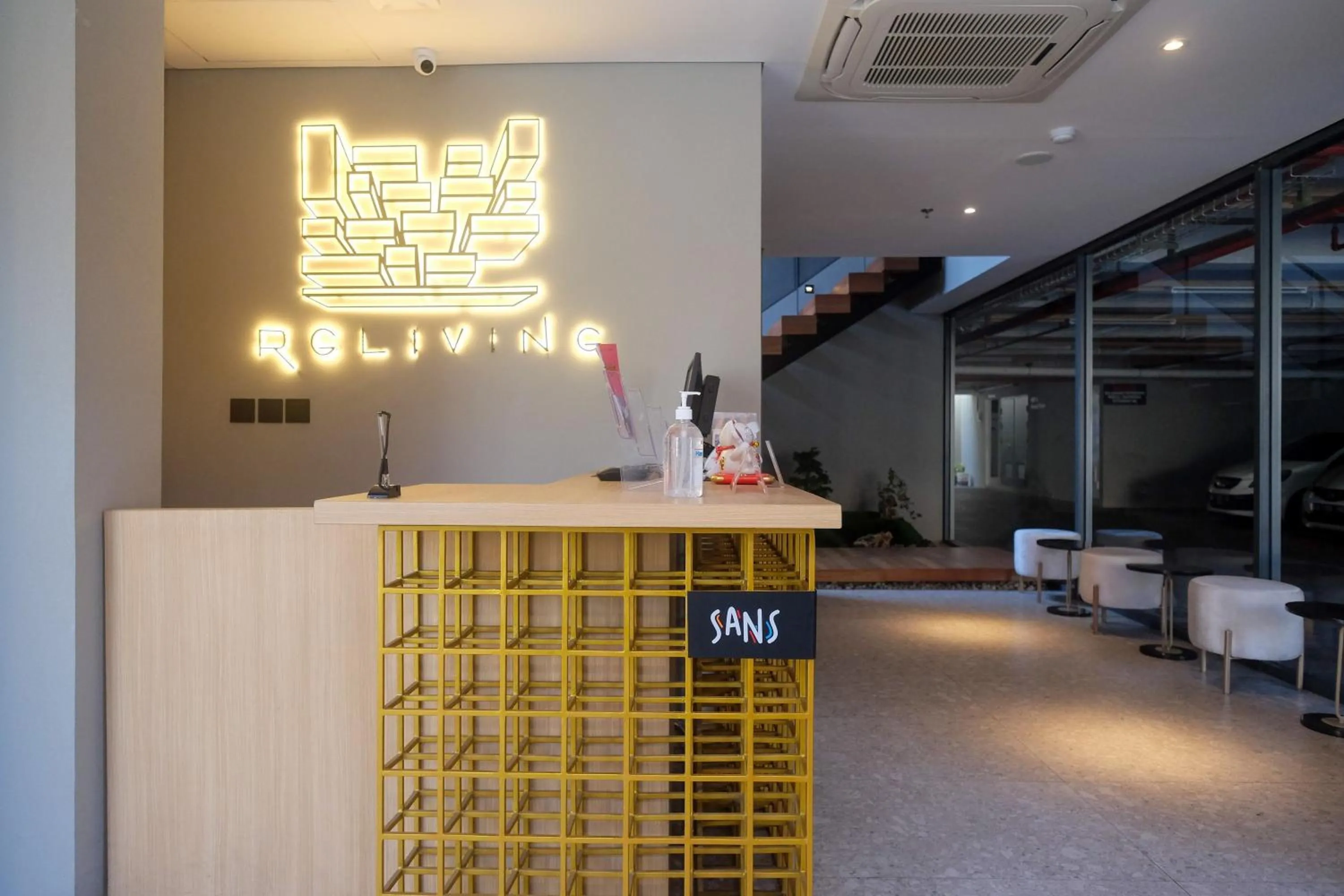 Lobby or reception in Sans Hotel RG Living Jogja by RedDoorz