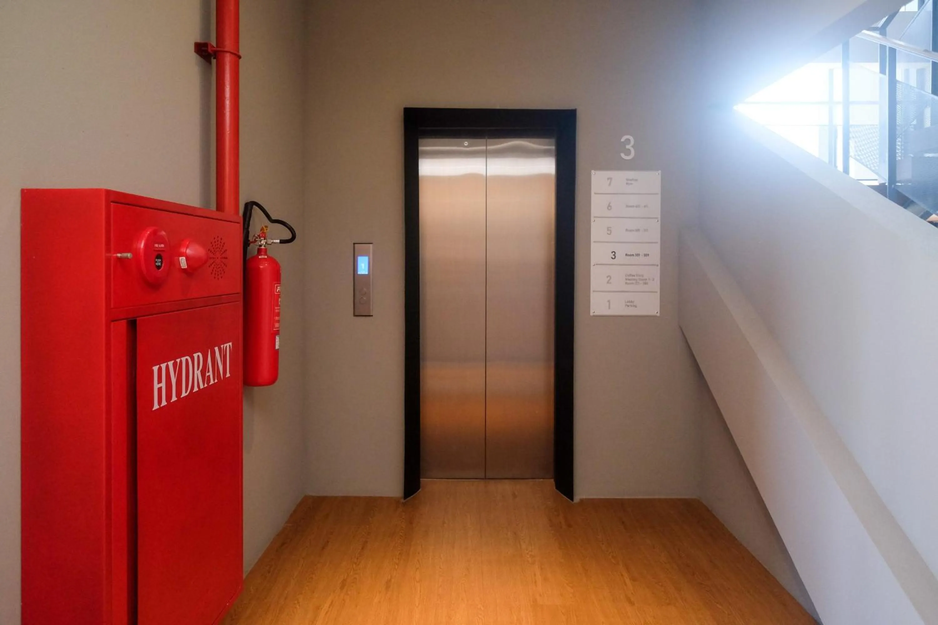 elevator in Sans Hotel RG Living Jogja by RedDoorz