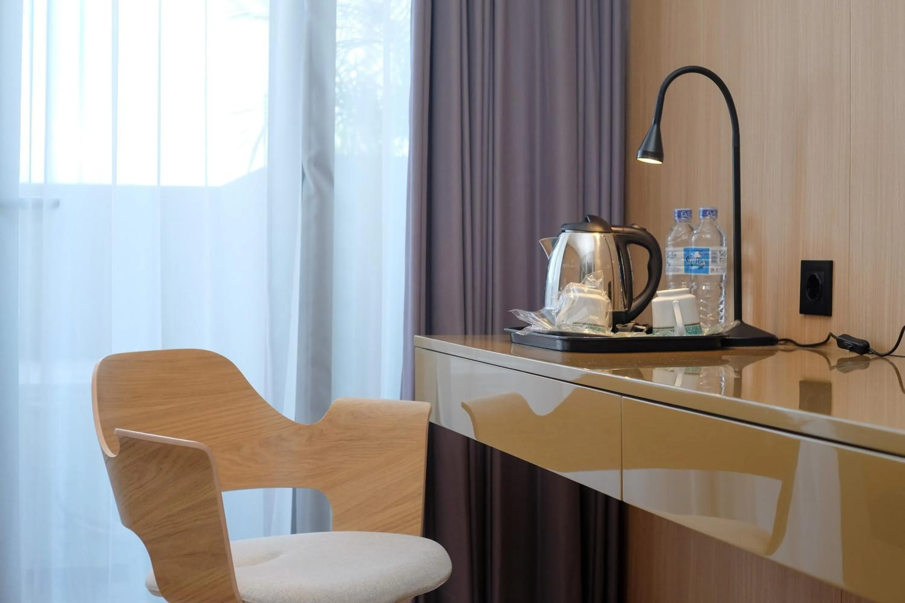 Coffee/tea facilities in Sans Hotel RG Living Jogja by RedDoorz