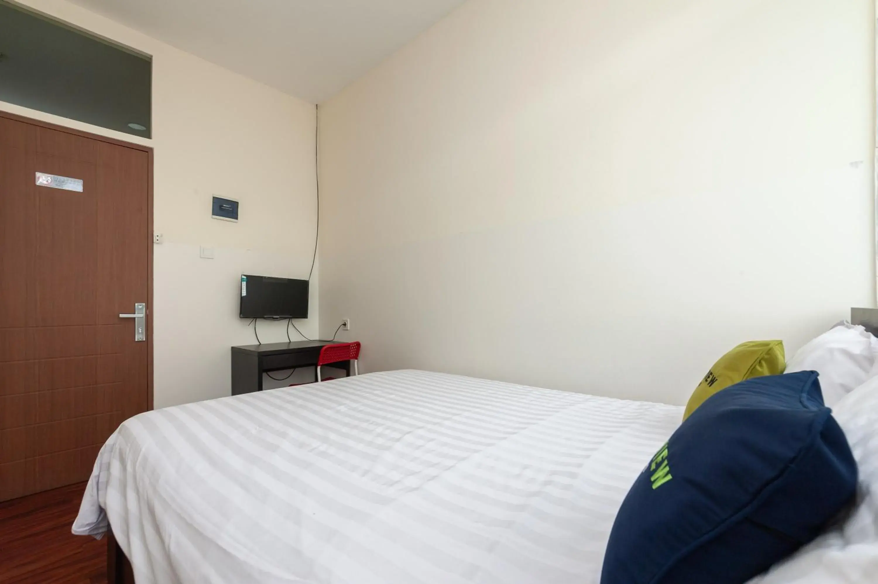 Bed in Urbanview Hotel Ellegan Residence Alam Sutera Serpong by RedDoorz Bed in Urbanview Hotel Ellegan Residence Alam Sutera Serpong by RedDoorz