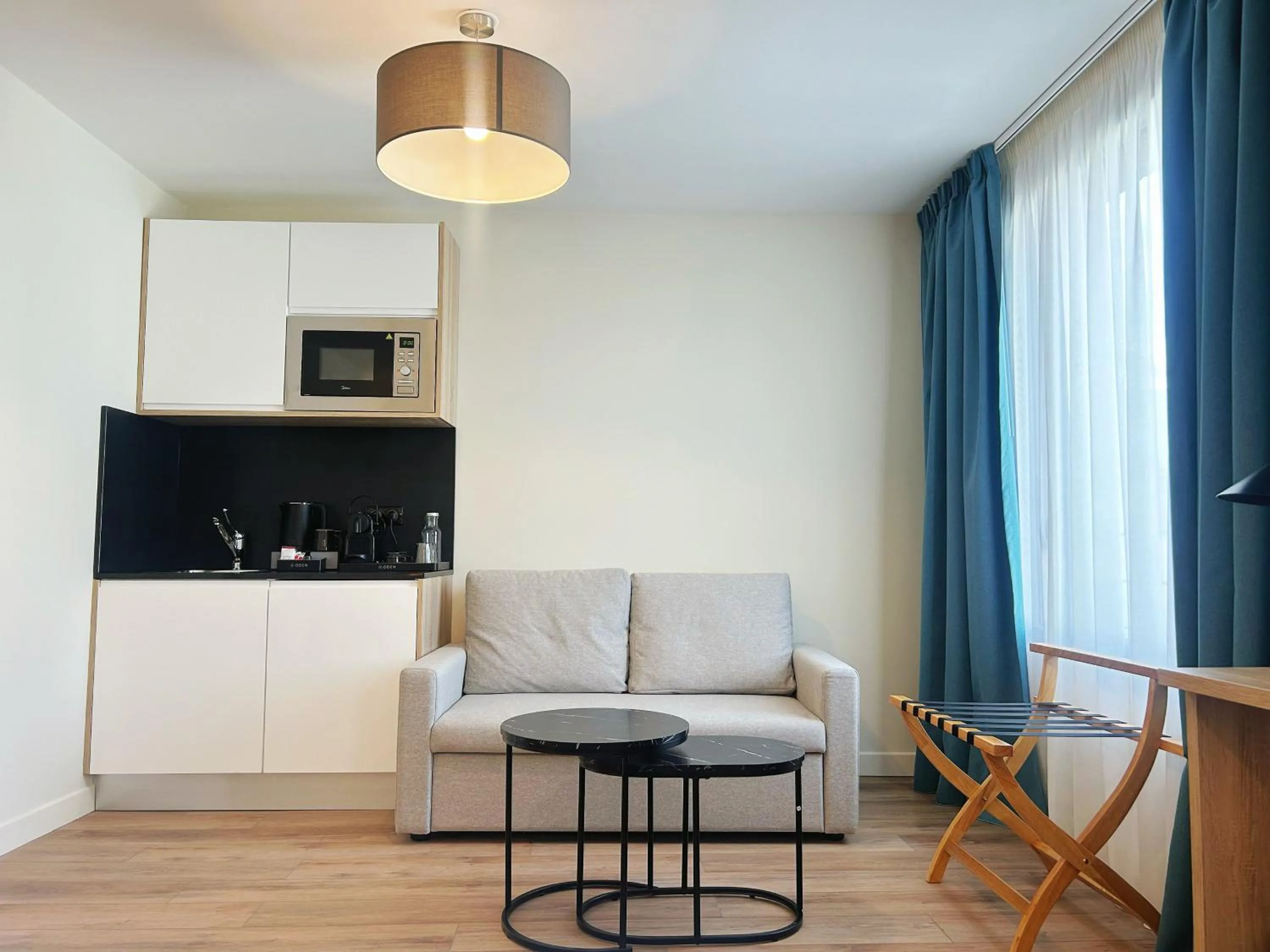Kitchen or kitchenette in Hôtel Oden Paris Ivry