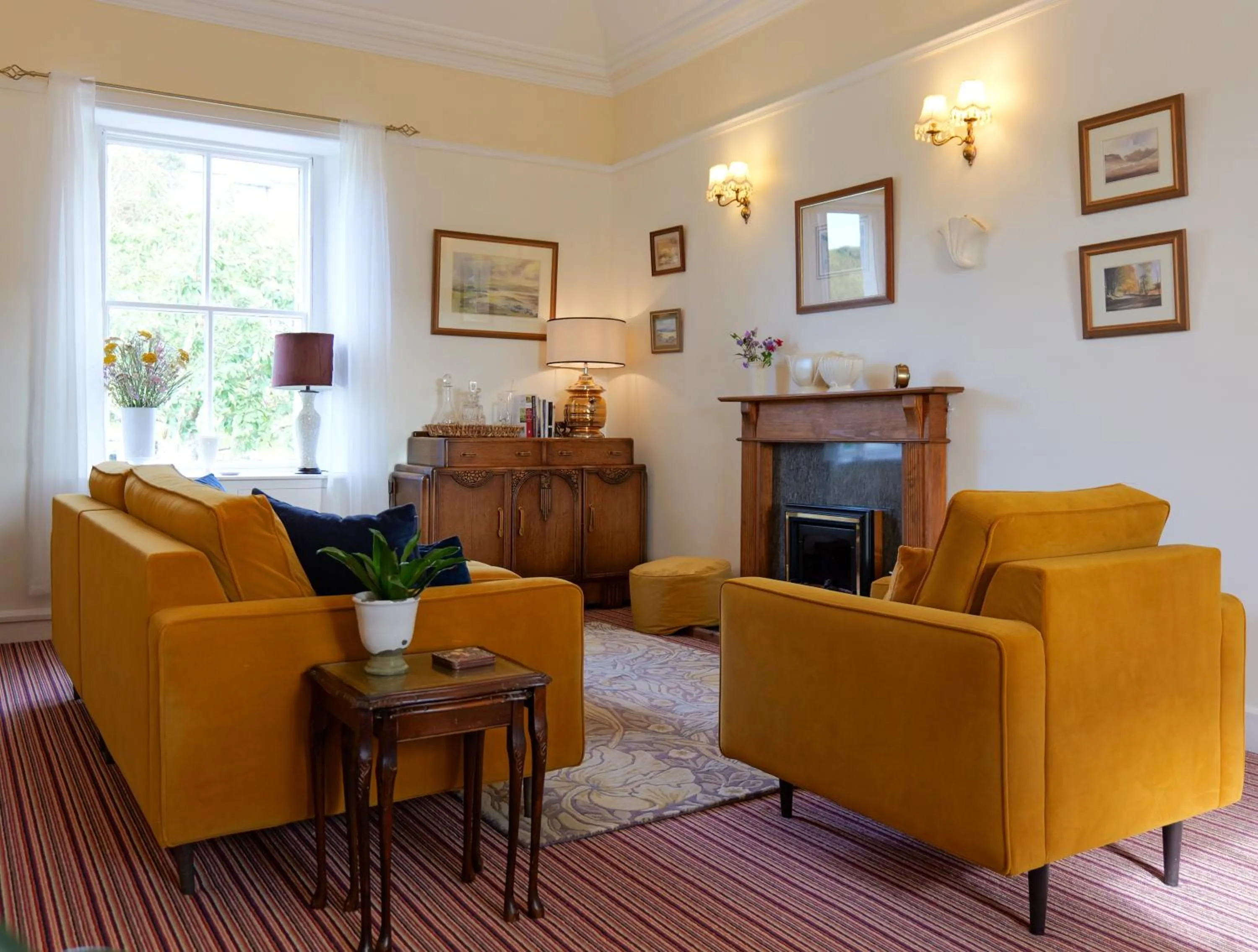 Communal lounge/ TV room in The Bellachroy