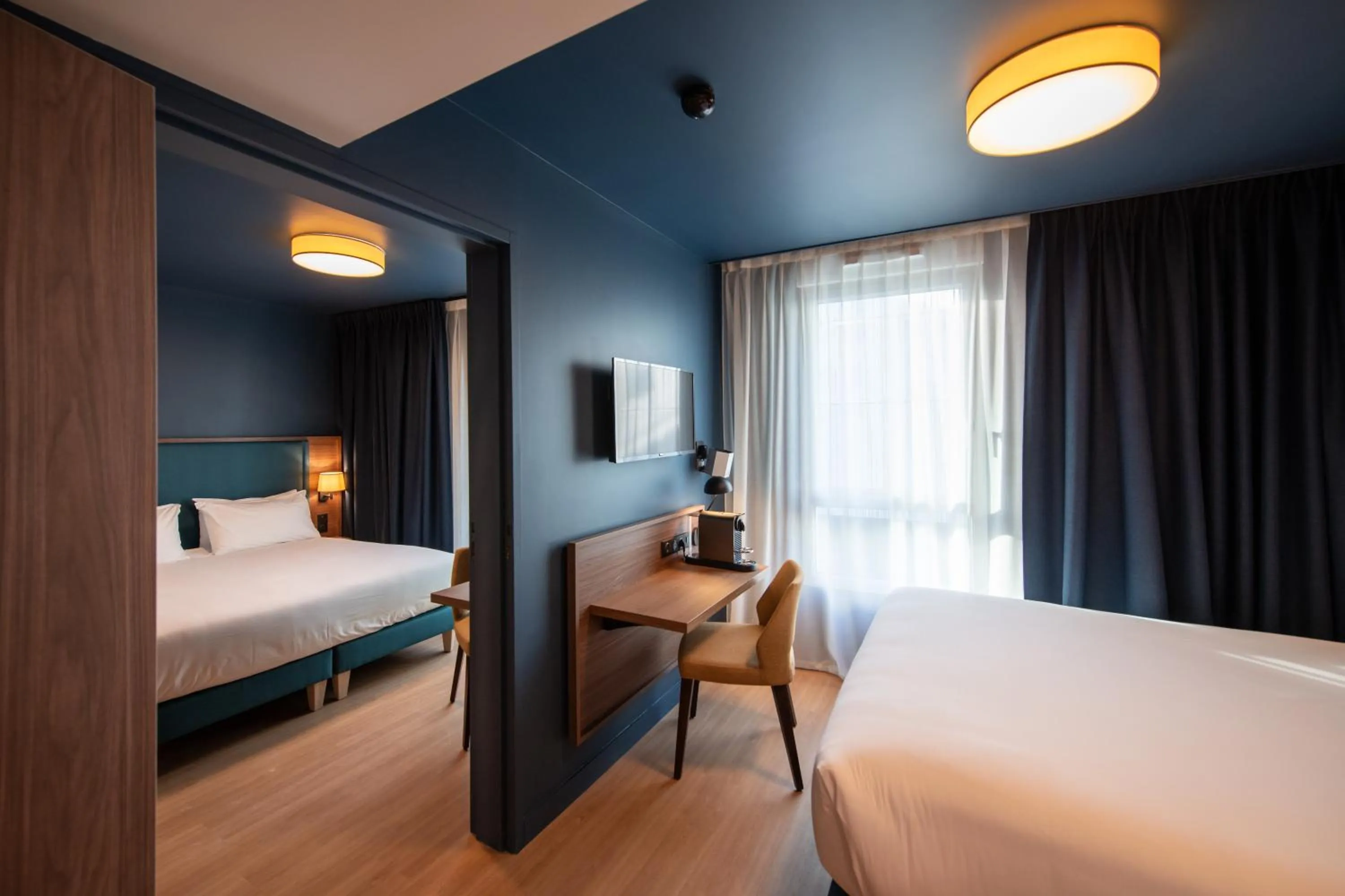 Bed in Hôtel de la Cité