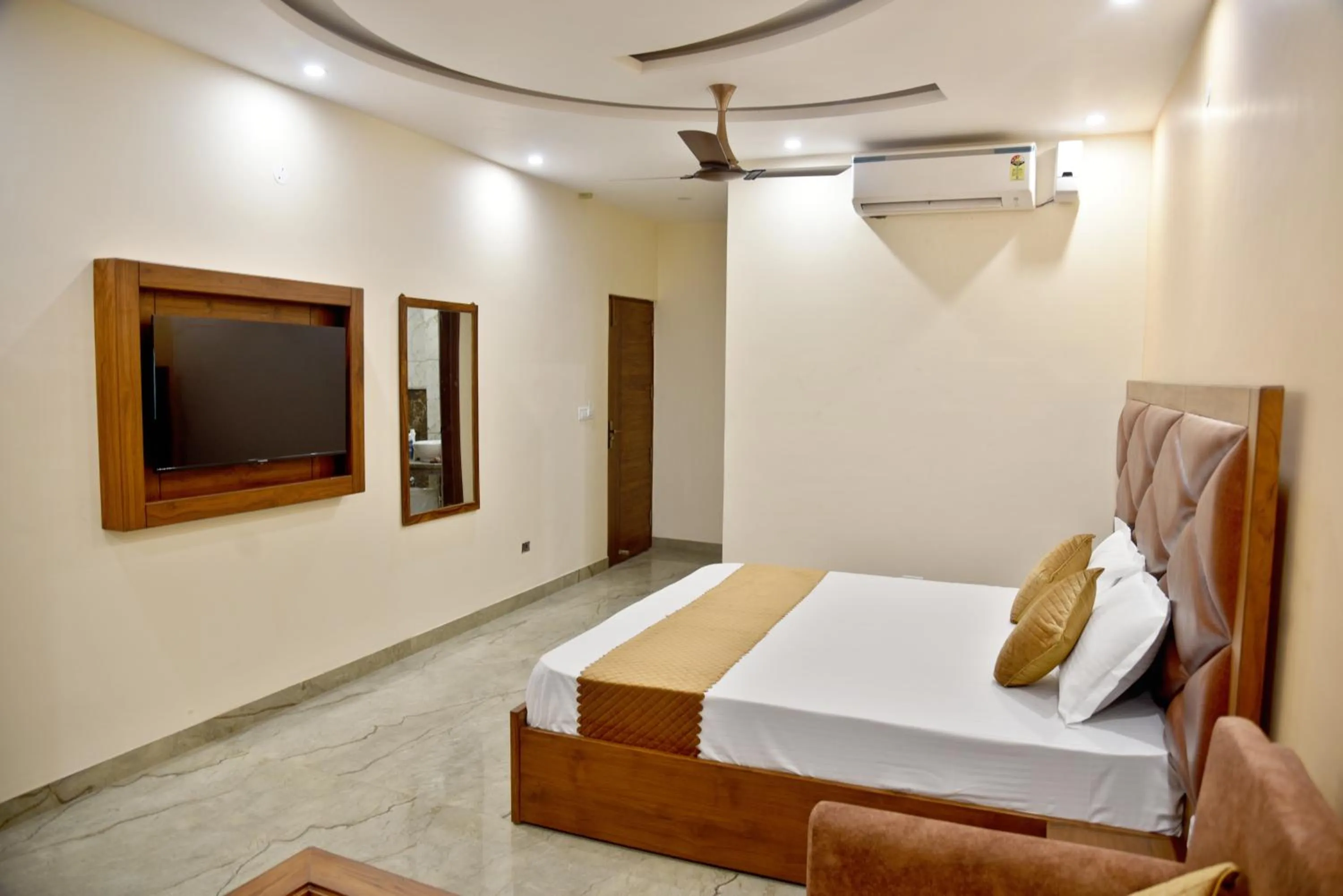 Photo of the whole room, TV/Entertainment Center in HOTEL AROMA CROWN