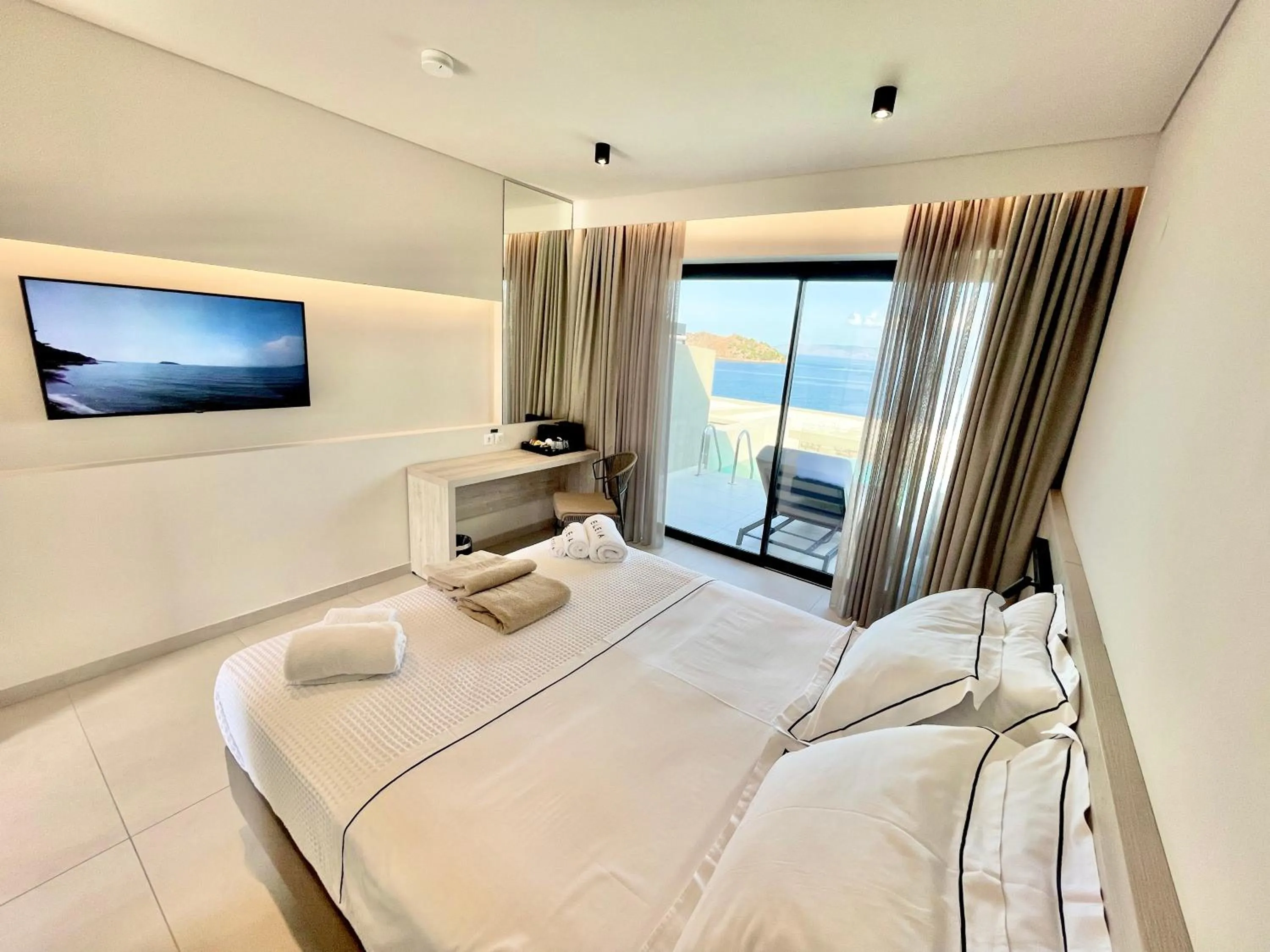 Bed in Eleia Seafront Rooms & Villas