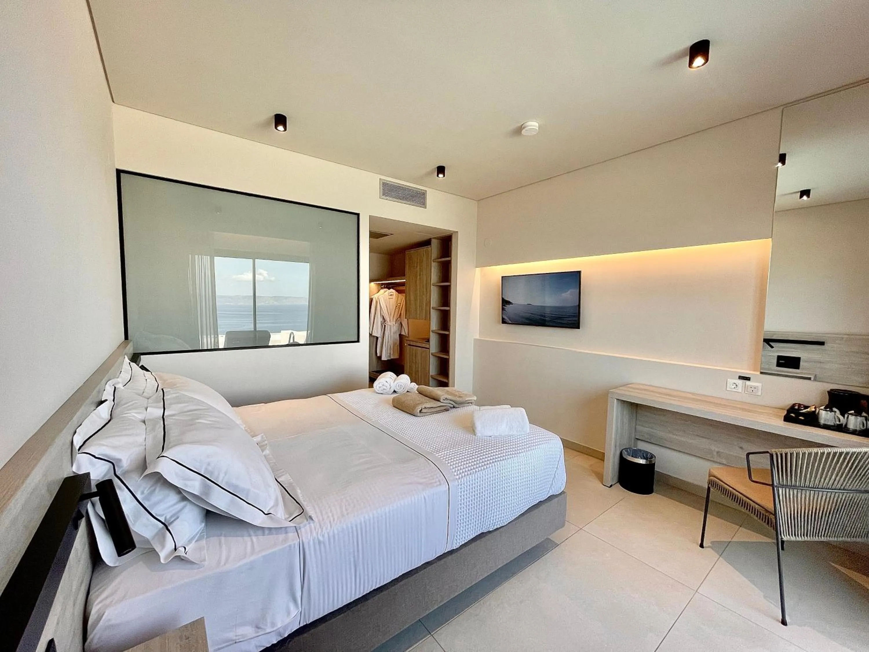 Bed in Eleia Seafront Rooms & Villas