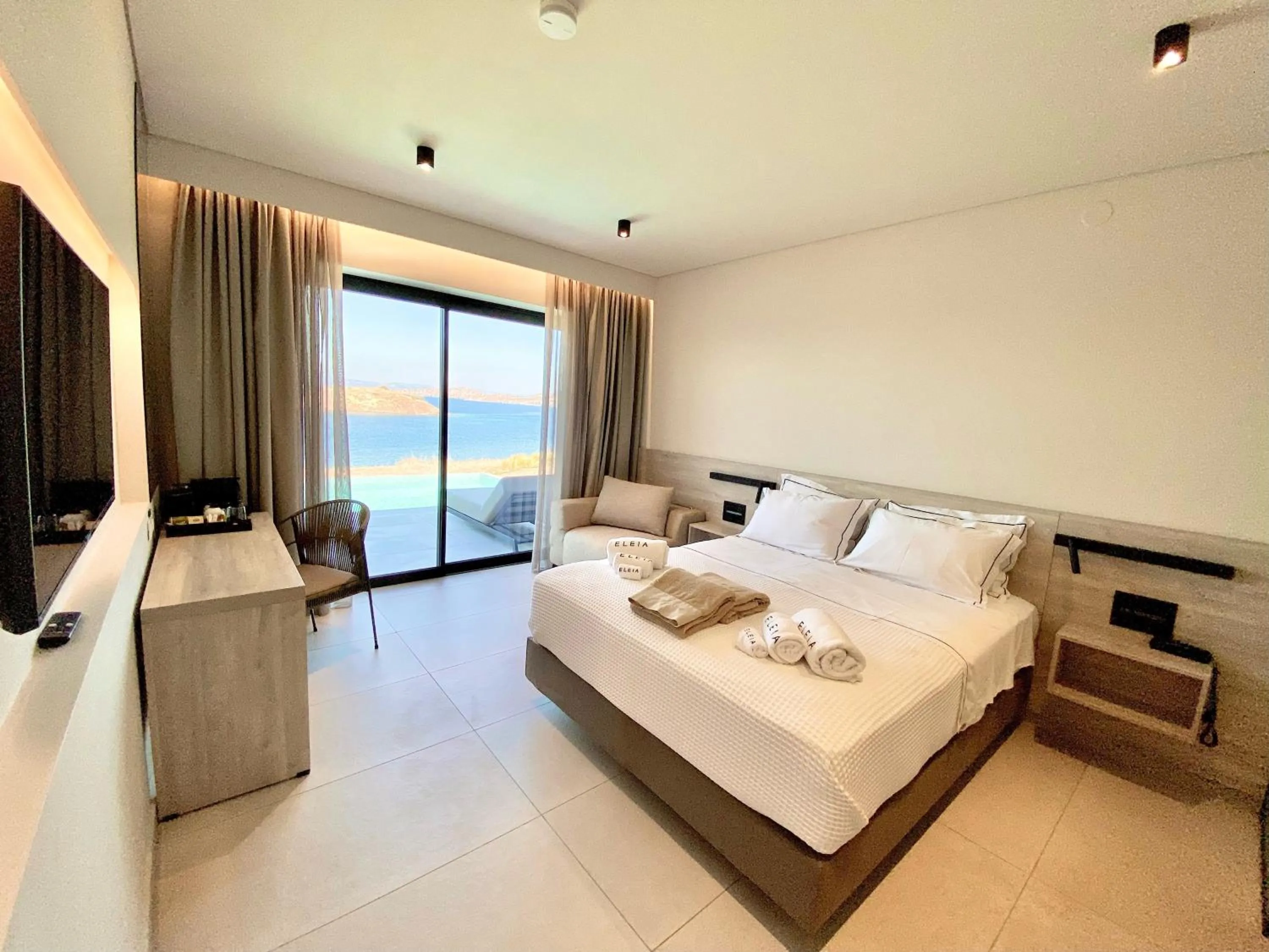 Bed in Eleia Seafront Rooms & Villas
