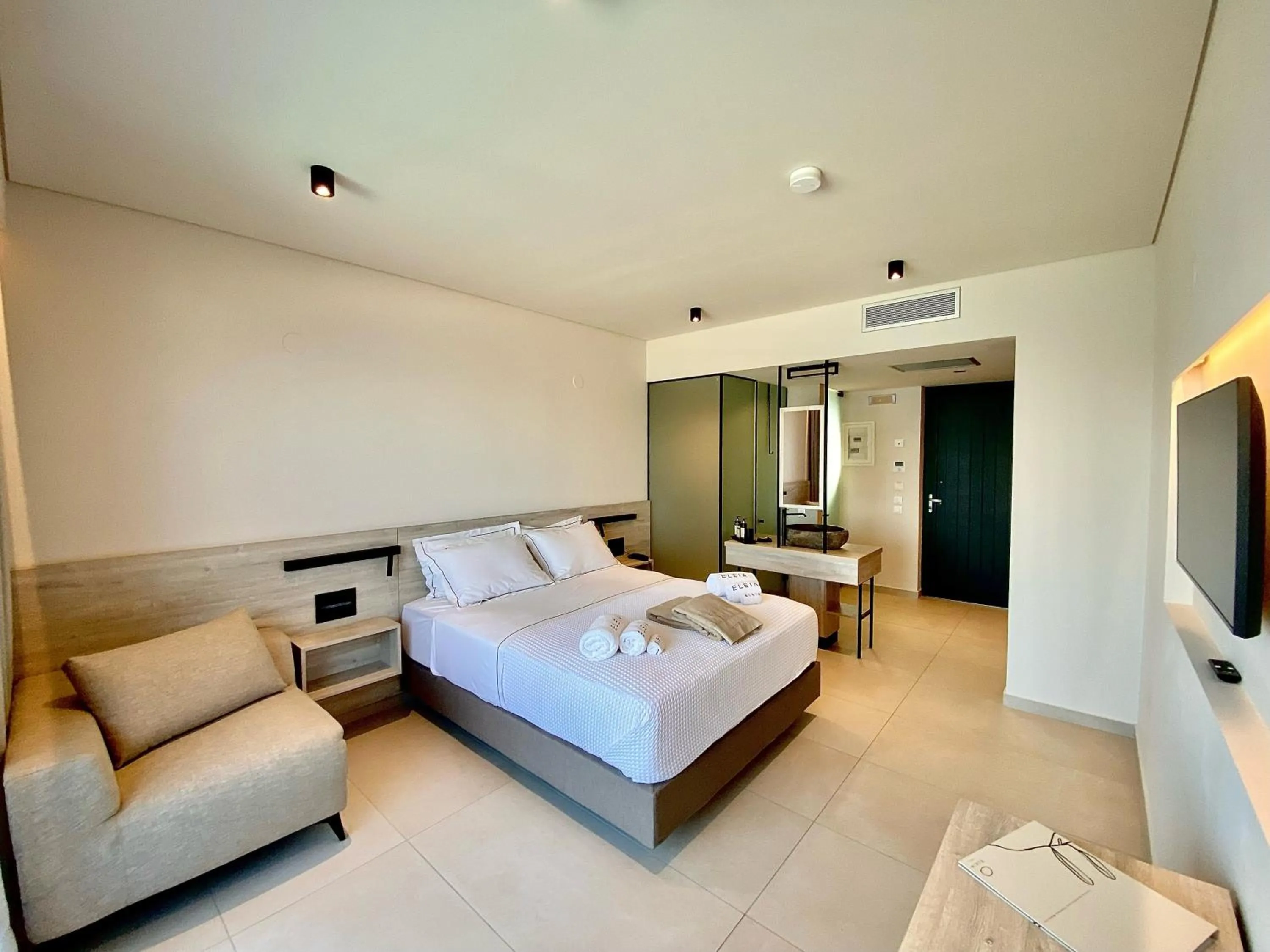 Bed in Eleia Seafront Rooms & Villas