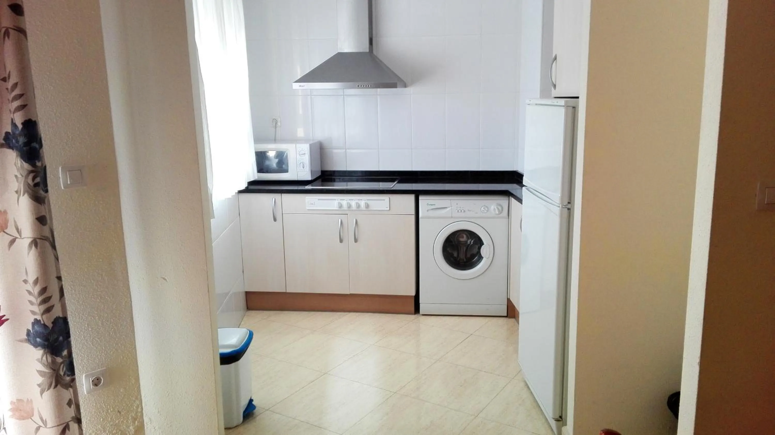 Kitchen or kitchenette in Apartamentos Marcomar 3000