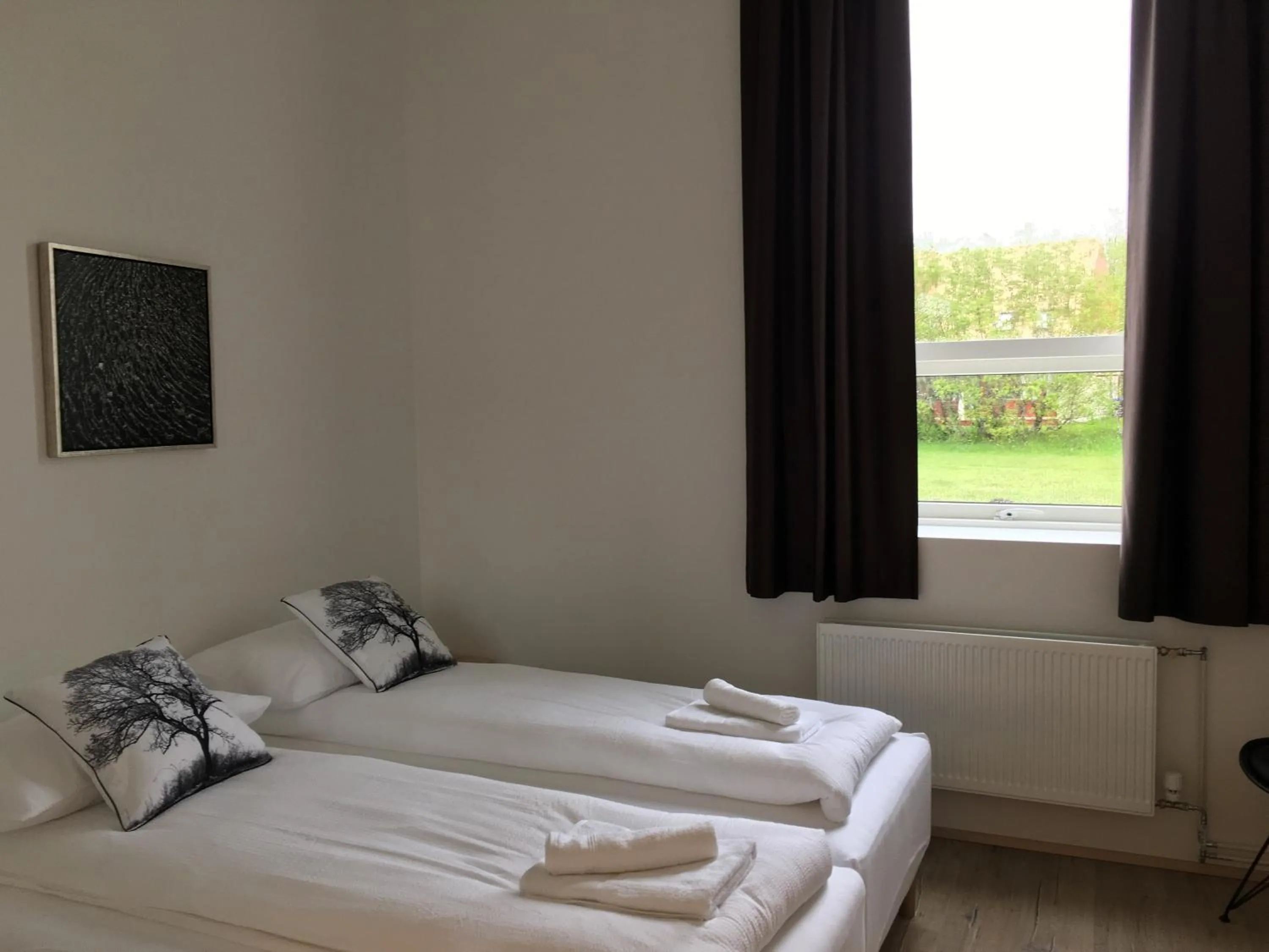 Bed in Welcome Riverside Guesthouse