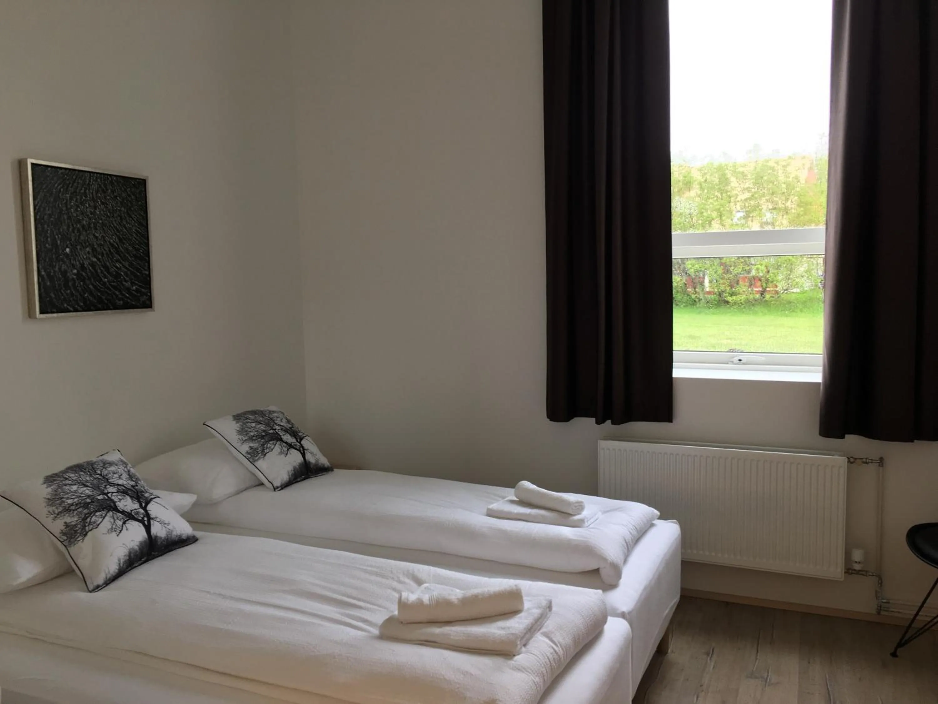 Bed in Welcome Riverside Guesthouse