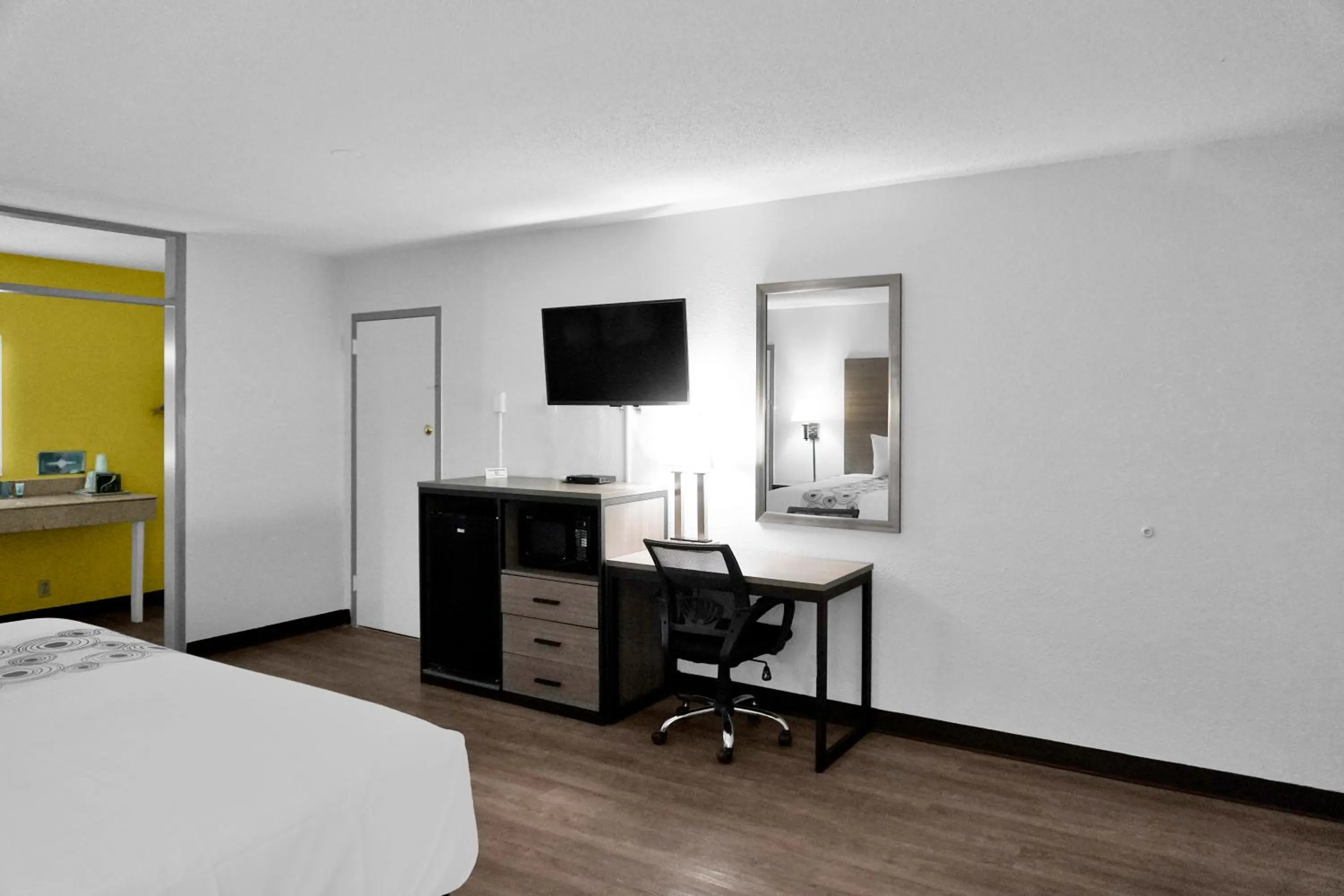 Bed in Hometown Inn + Kitchen