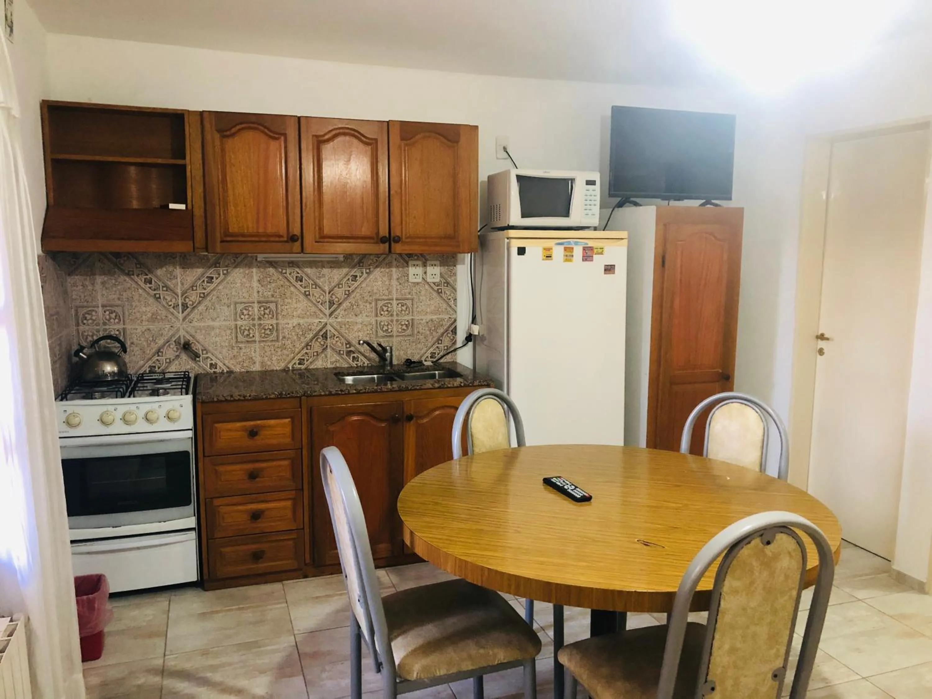Kitchen or kitchenette in Apart-Hotel Gibert's House
