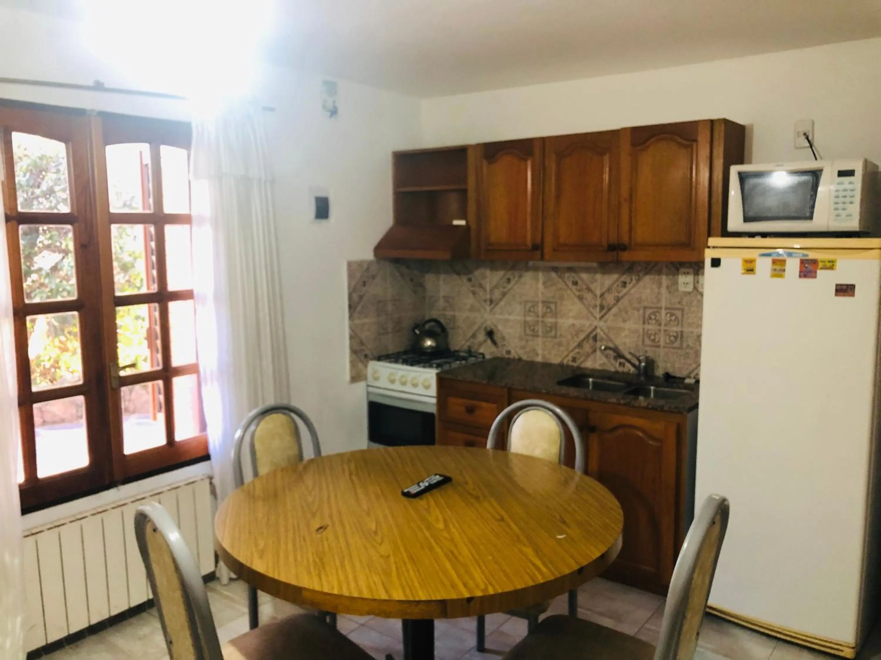 Kitchen or kitchenette in Apart-Hotel Gibert's House