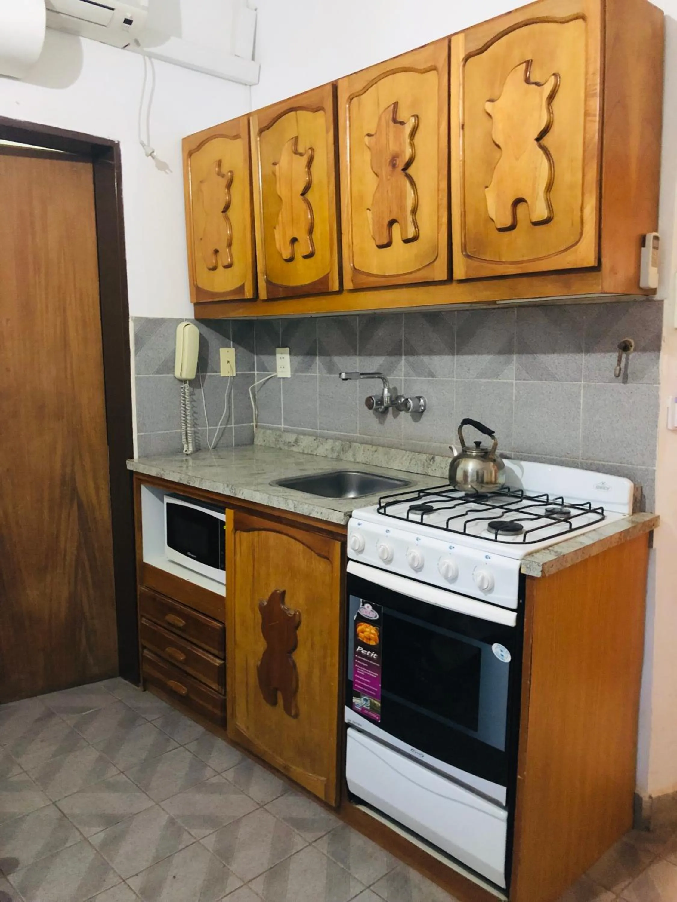 Kitchen or kitchenette in Apart-Hotel Gibert's House