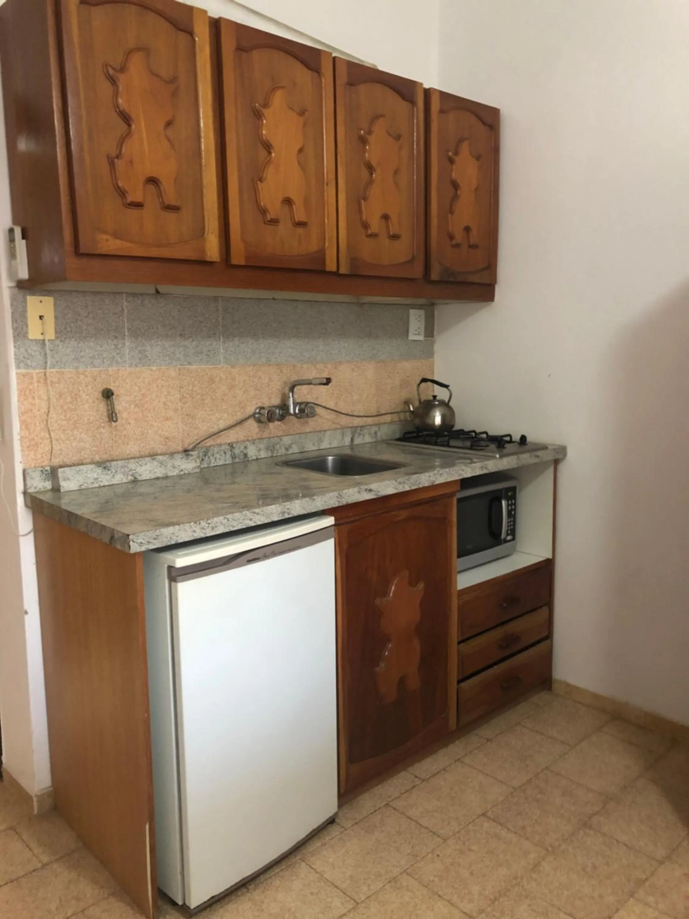 Kitchen or kitchenette in Apart-Hotel Gibert's House