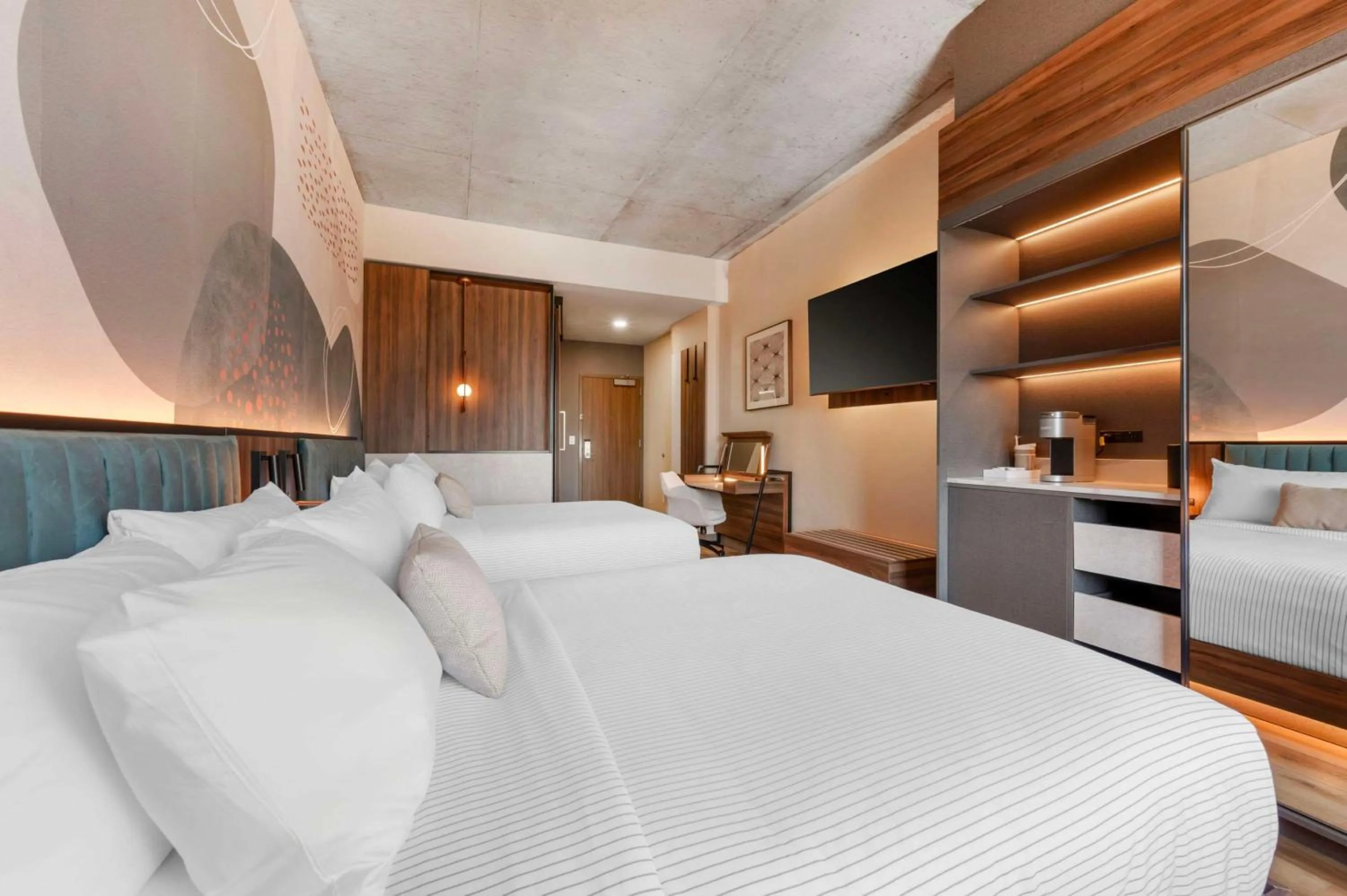 Bed in Cambria Hotel Nashville Midtown