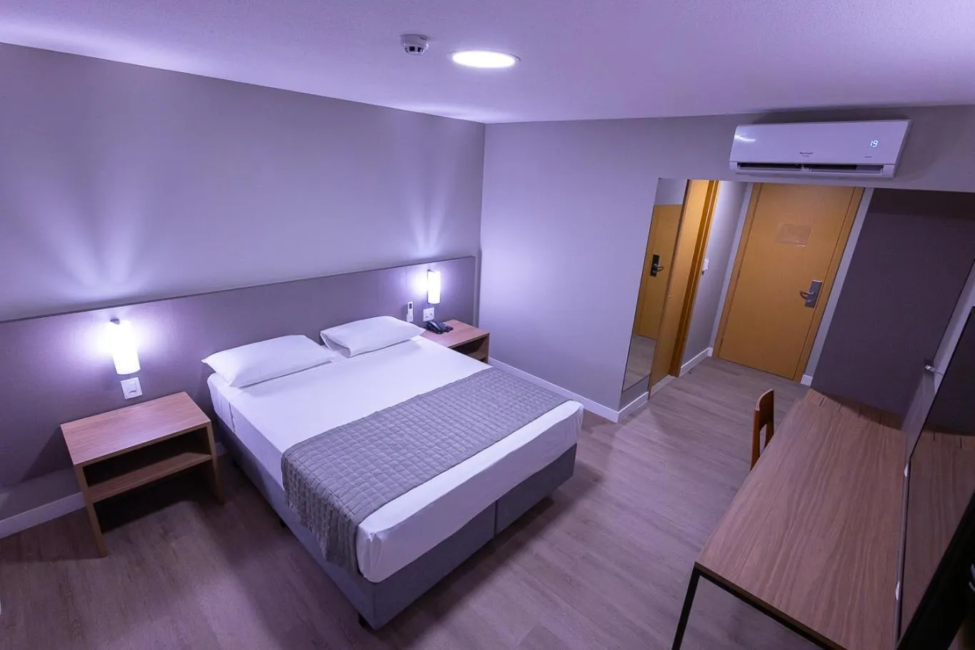 Bed in Hotel Caiuá Blumenau