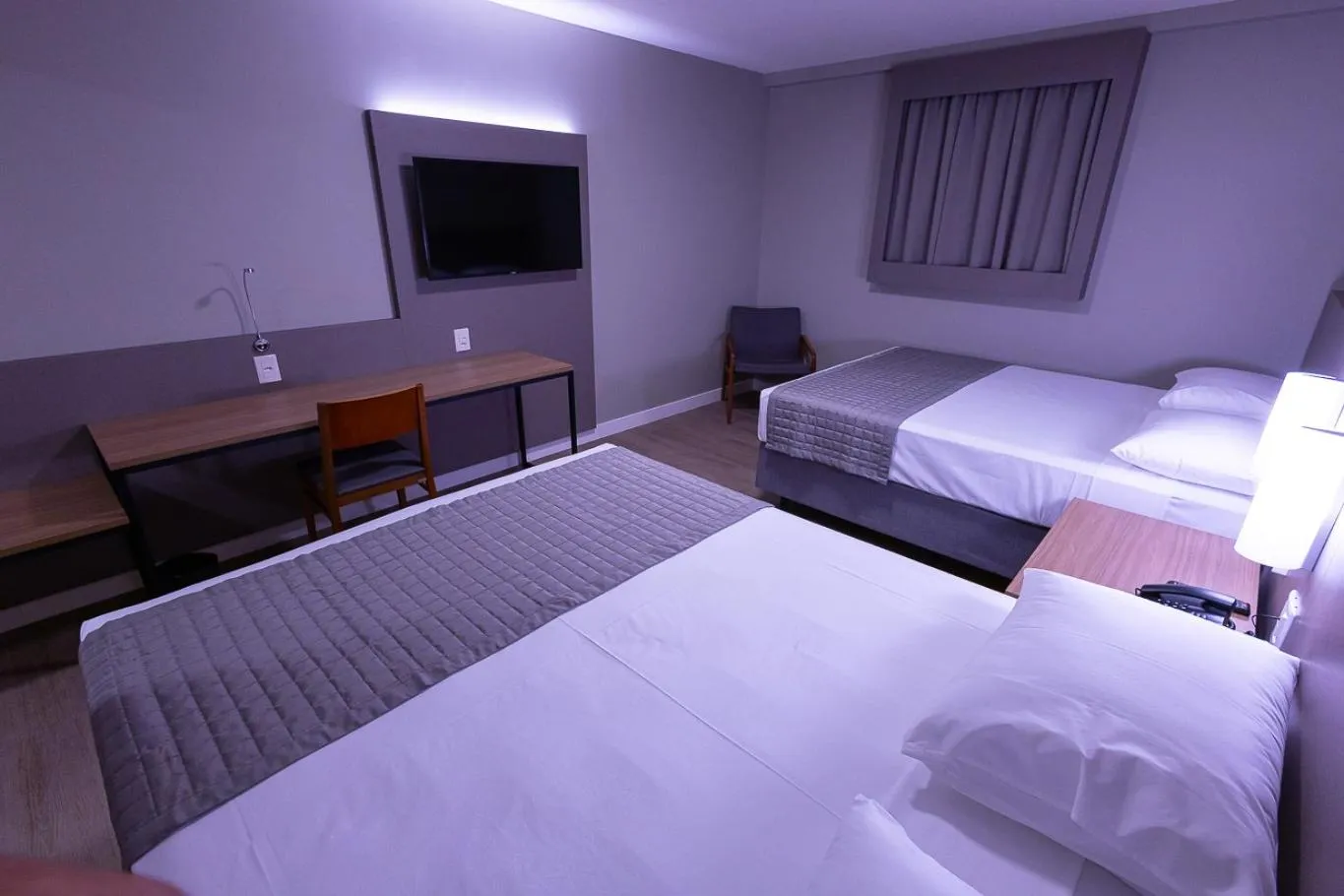 Photo of the whole room, Bed in Hotel Caiuá Blumenau
