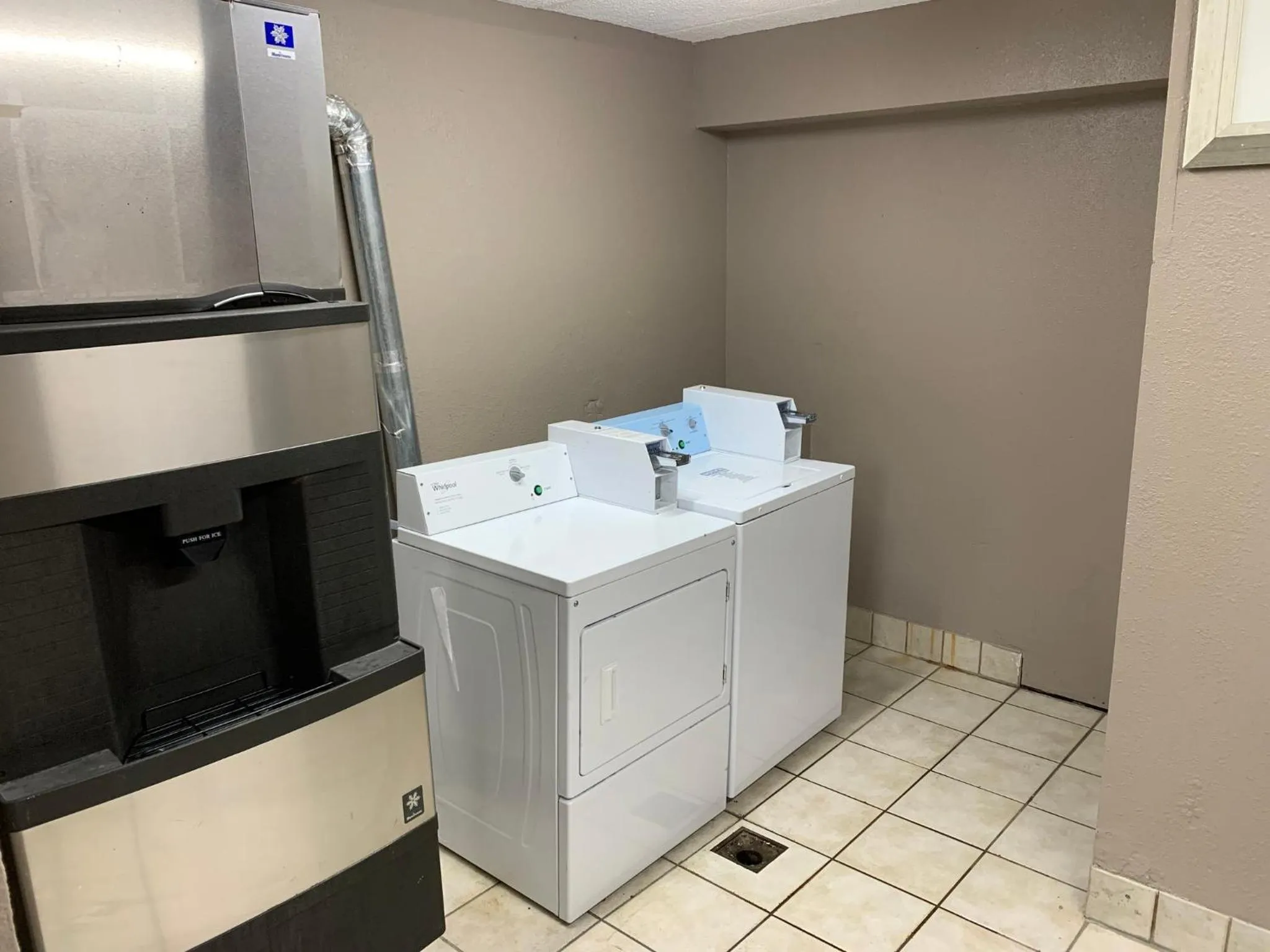 laundry in HomeTowne Studios by Red Roof Mystic - New London