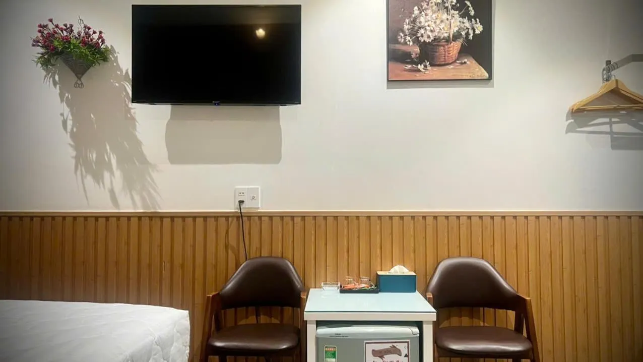 Bed in ĐÔNG NHƯ HOTEL