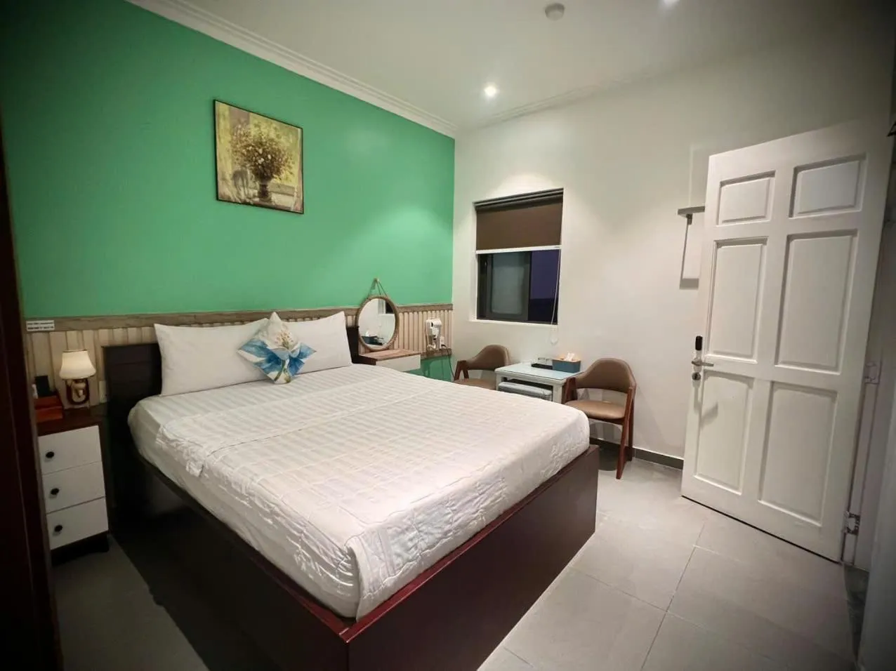 Bed in ĐÔNG NHƯ HOTEL