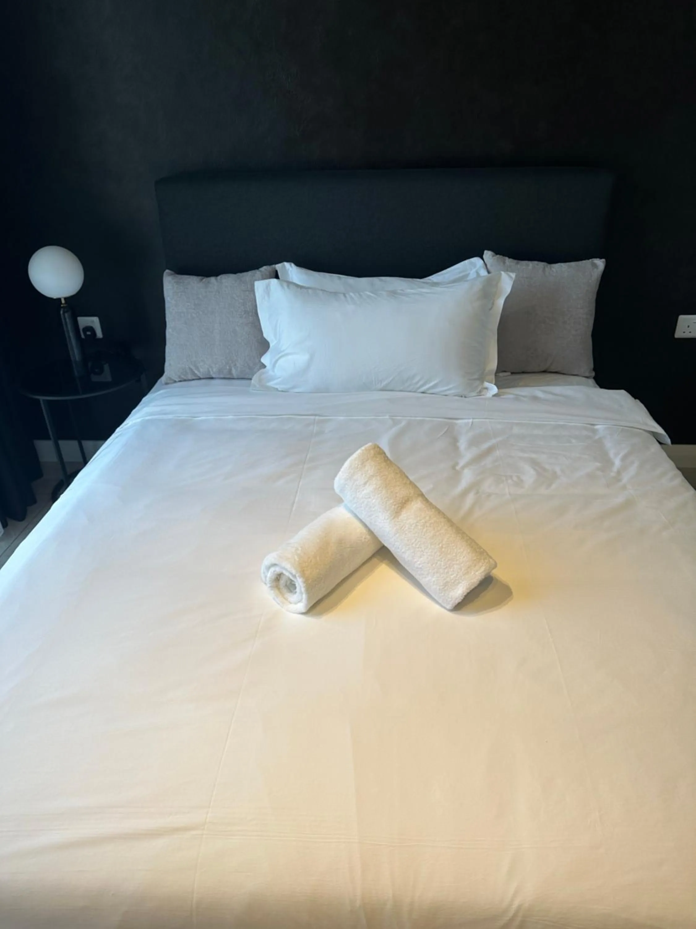 Bed in Axon Residence at Pavilion KLCC KL Tower view by KIMIRO