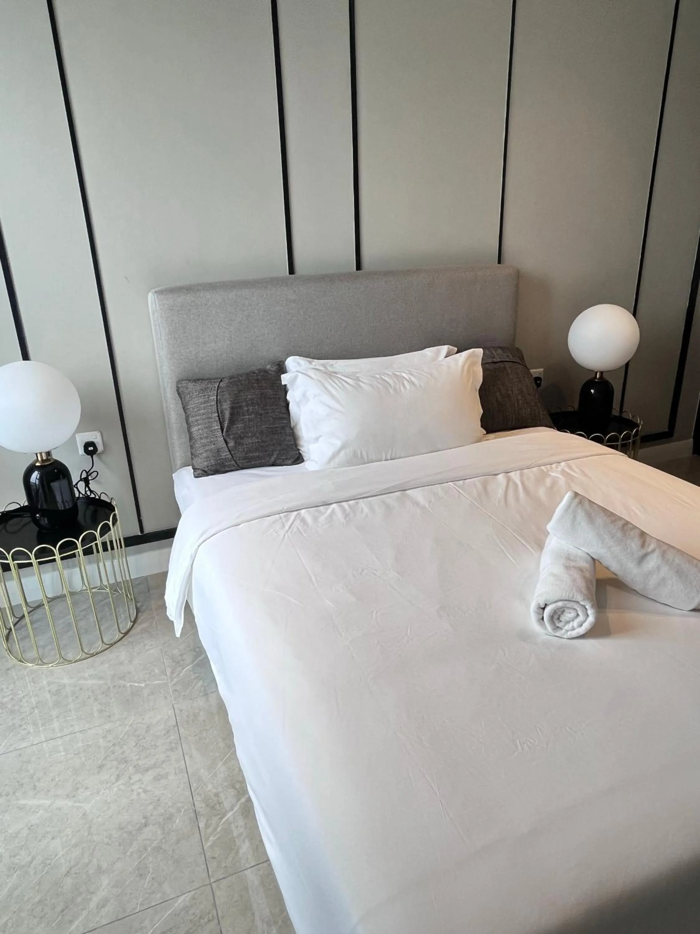 Bed in Axon Residence at Pavilion KLCC KL Tower view by KIMIRO