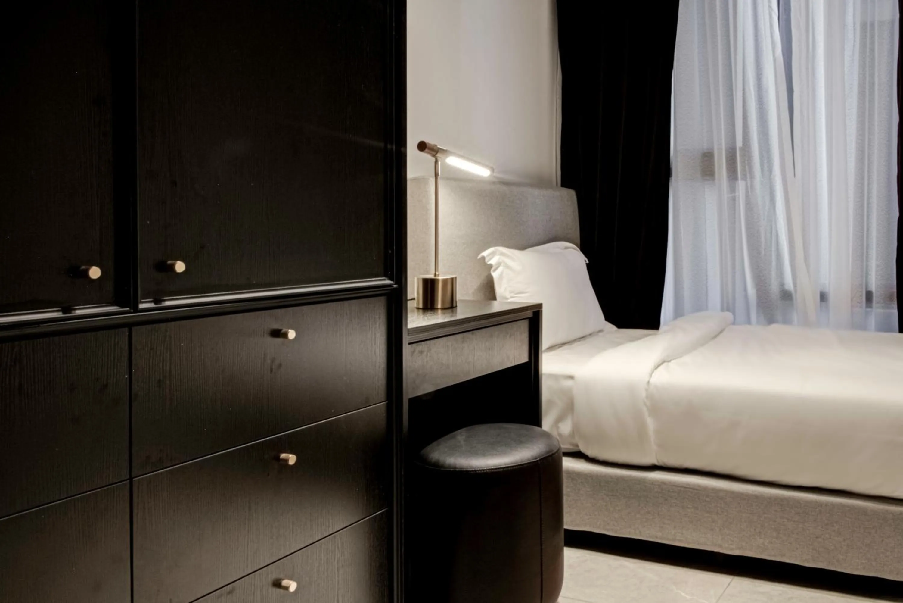 Bed in Axon Residence at Pavilion KLCC KL Tower view by KIMIRO