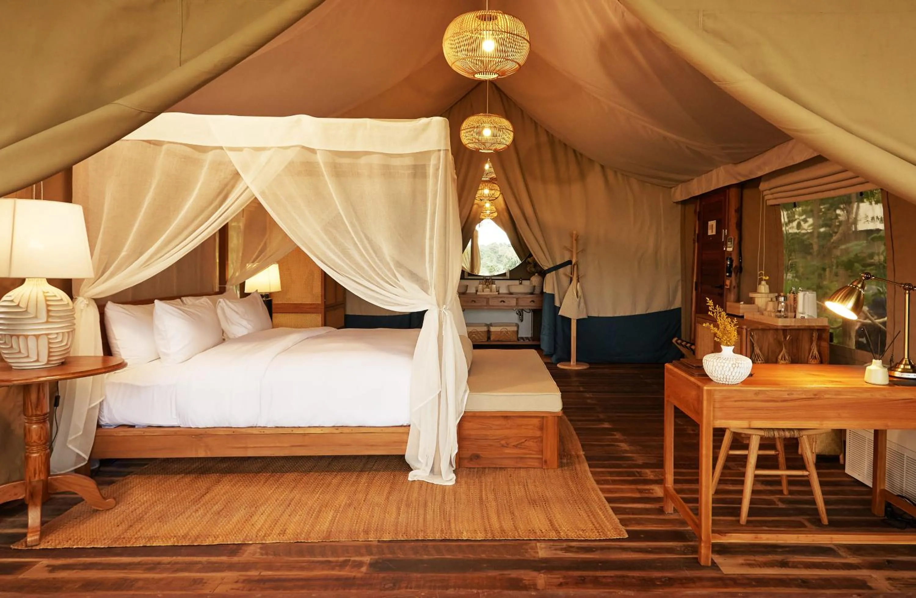 Bed in Tantawan Tented Camp by Dusit, Chiang Rai