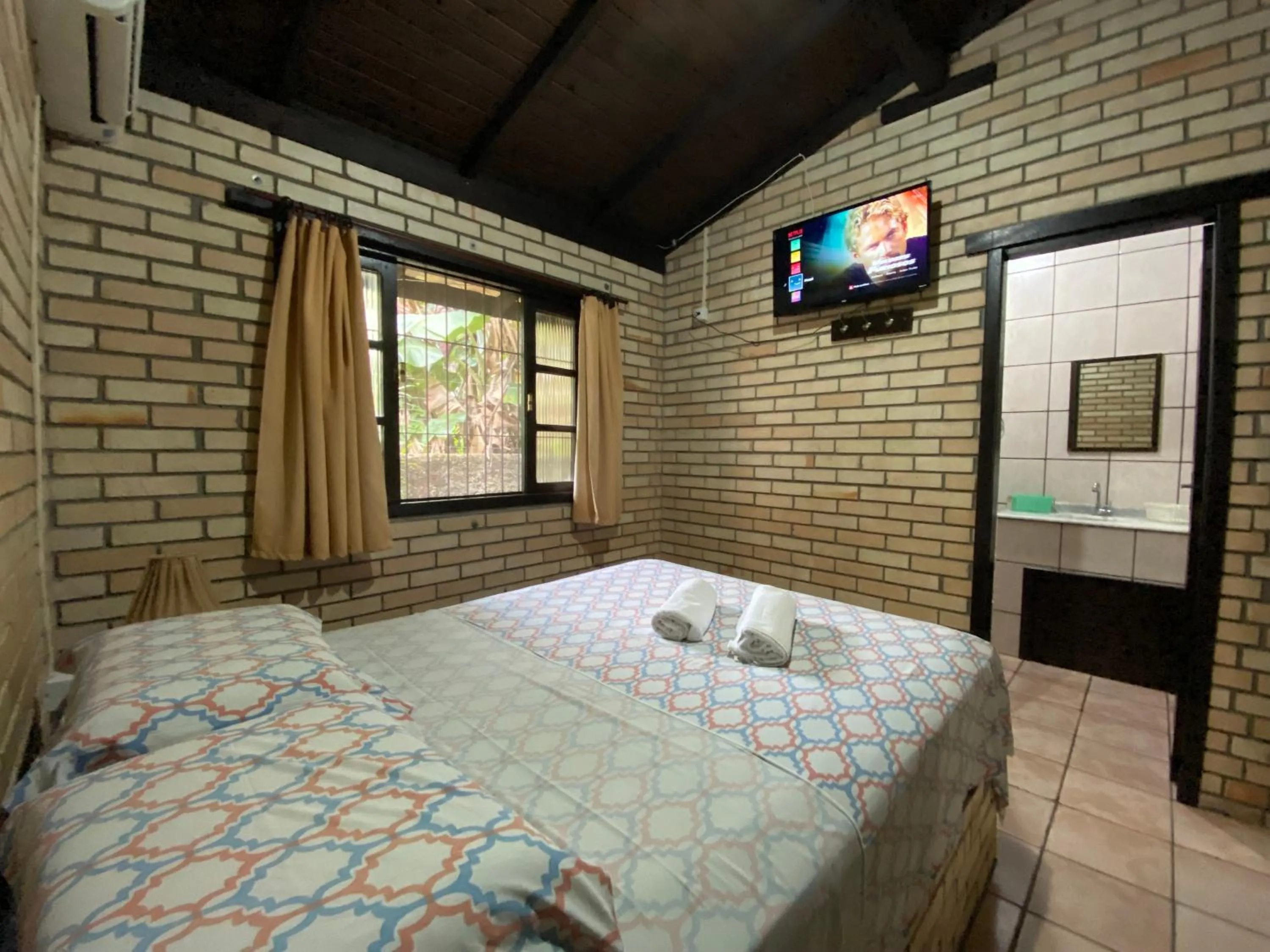 Bedroom, Bed in Chalés do Holandês Eco Pousada