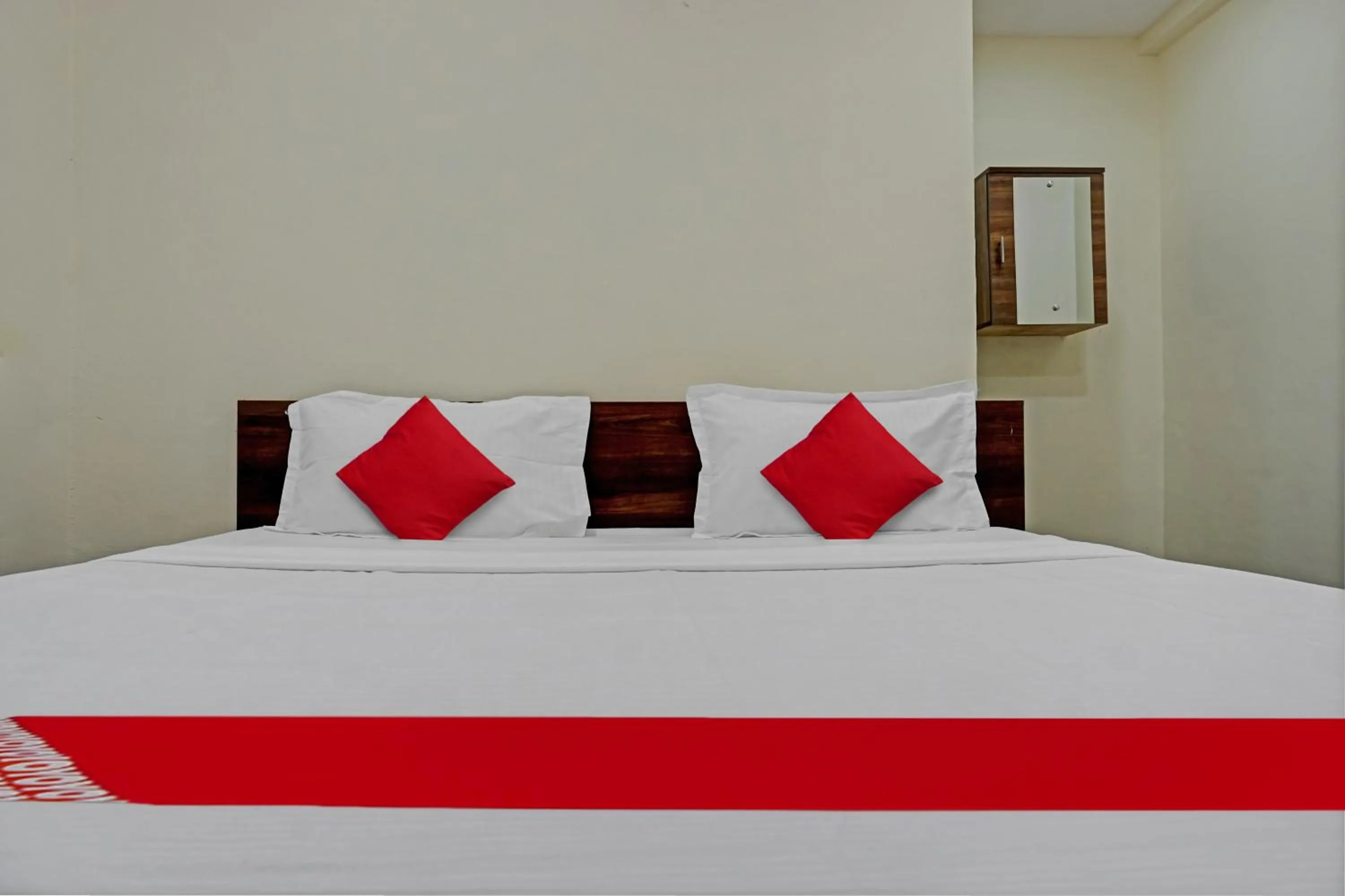 Bedroom in OYO Flagship Sai Balaji Lodge