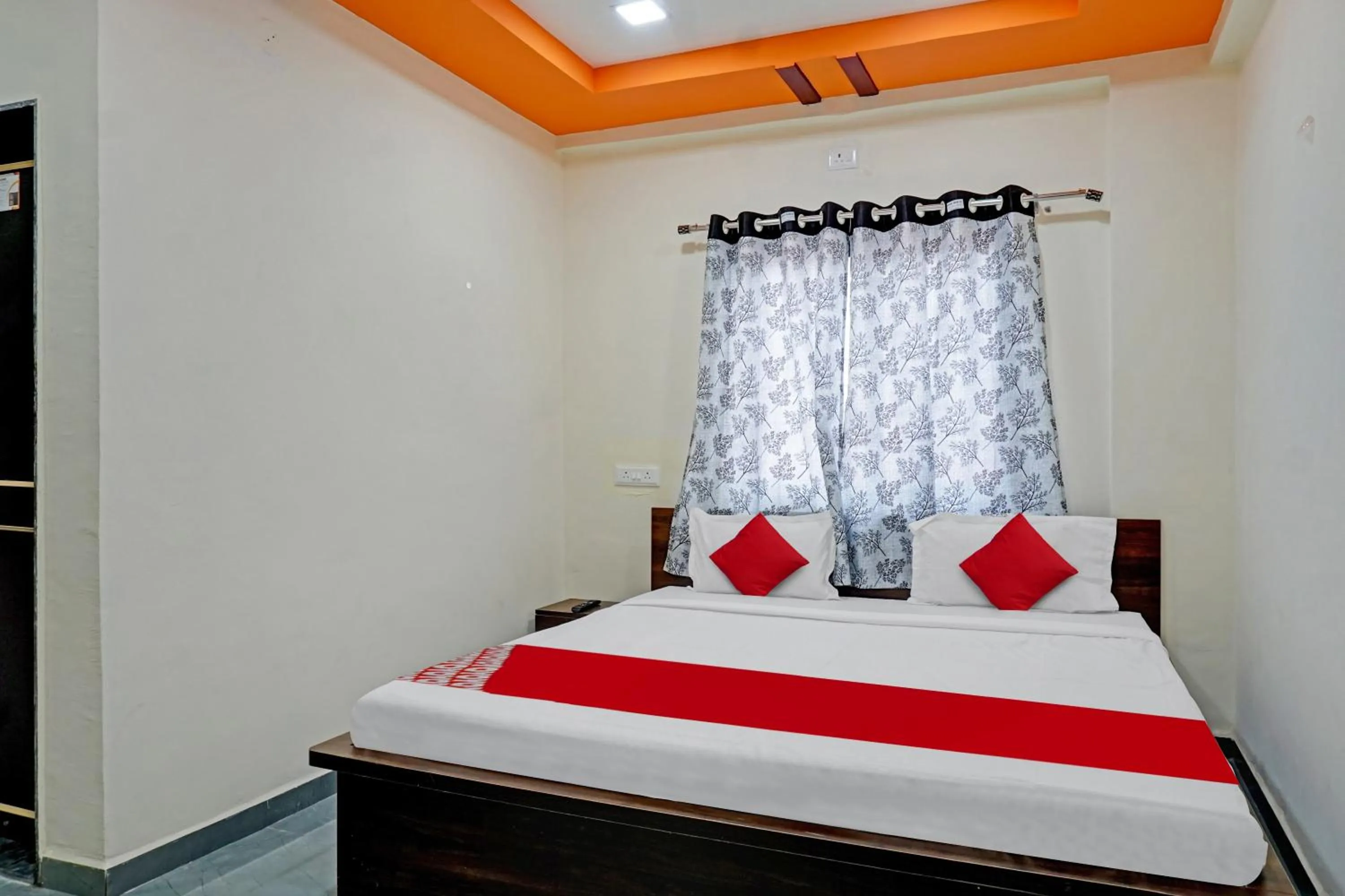 Bedroom in OYO Flagship Sai Balaji Lodge