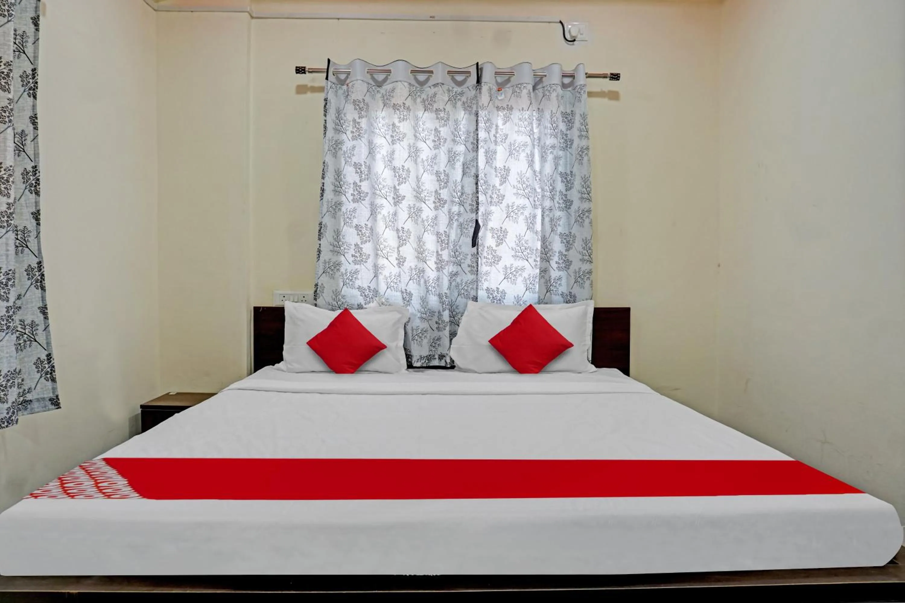 Bedroom in OYO Flagship Sai Balaji Lodge