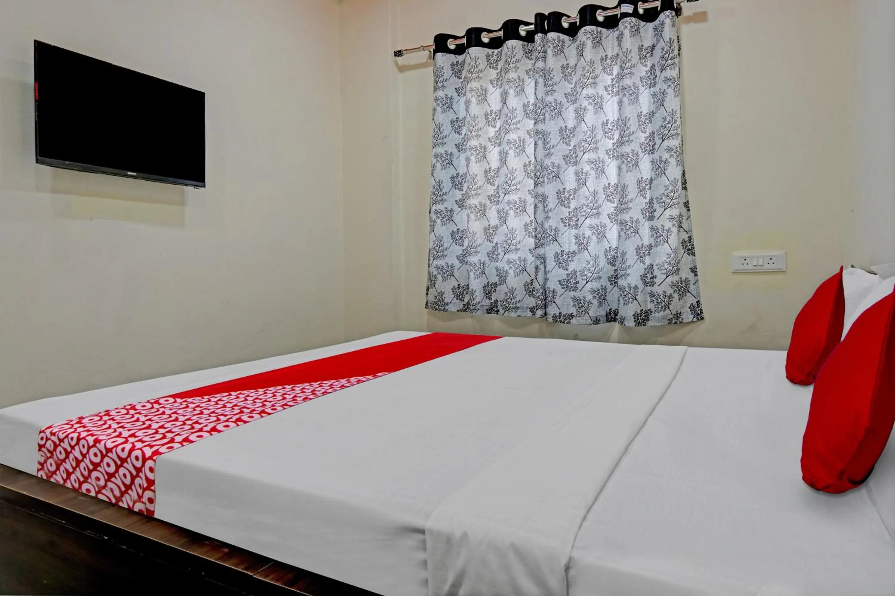 Bedroom in OYO Flagship Sai Balaji Lodge
